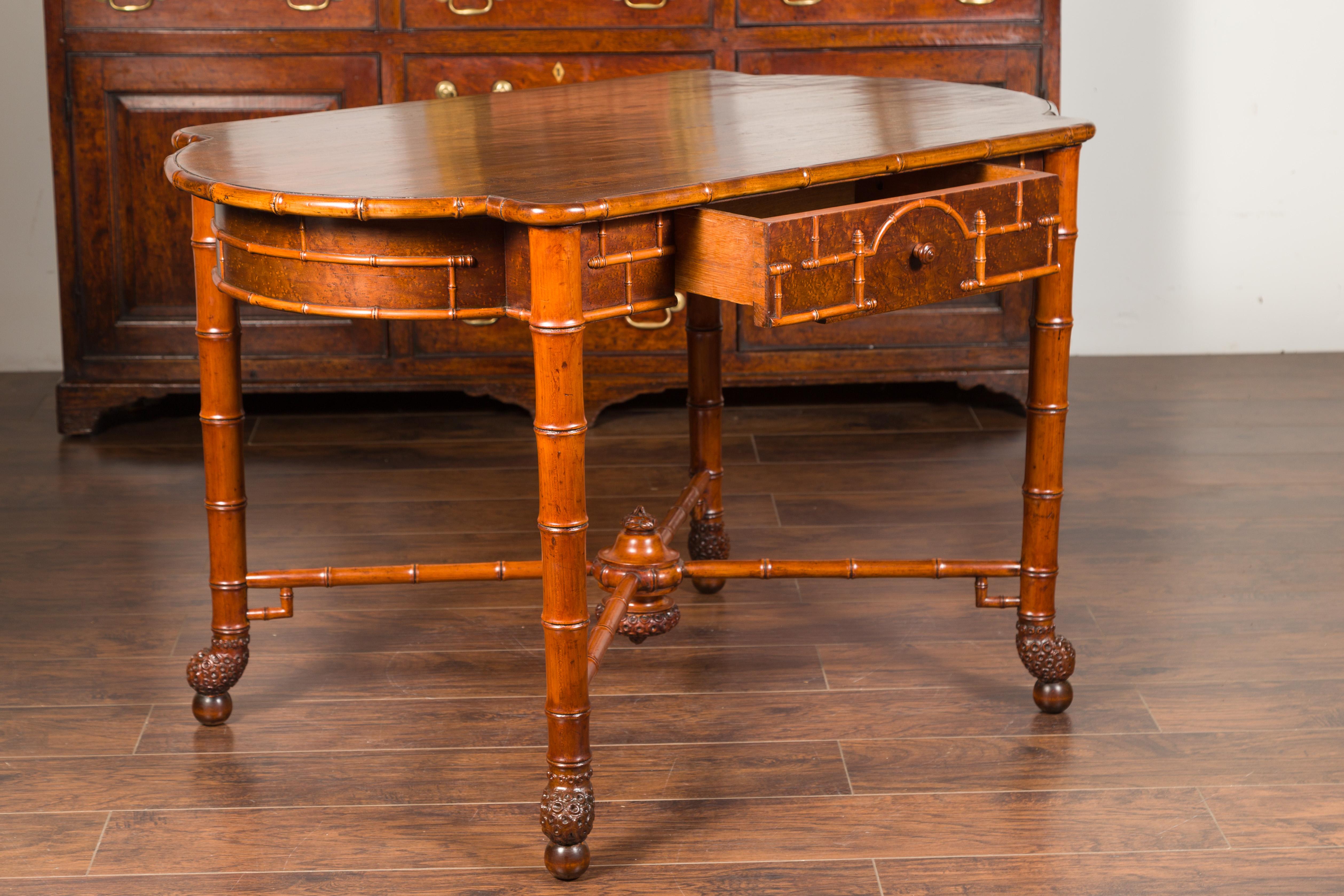 English 1870s Faux Bamboo Walnut Desk with Oval Top, Drawers and Root Style Feet For Sale 9
