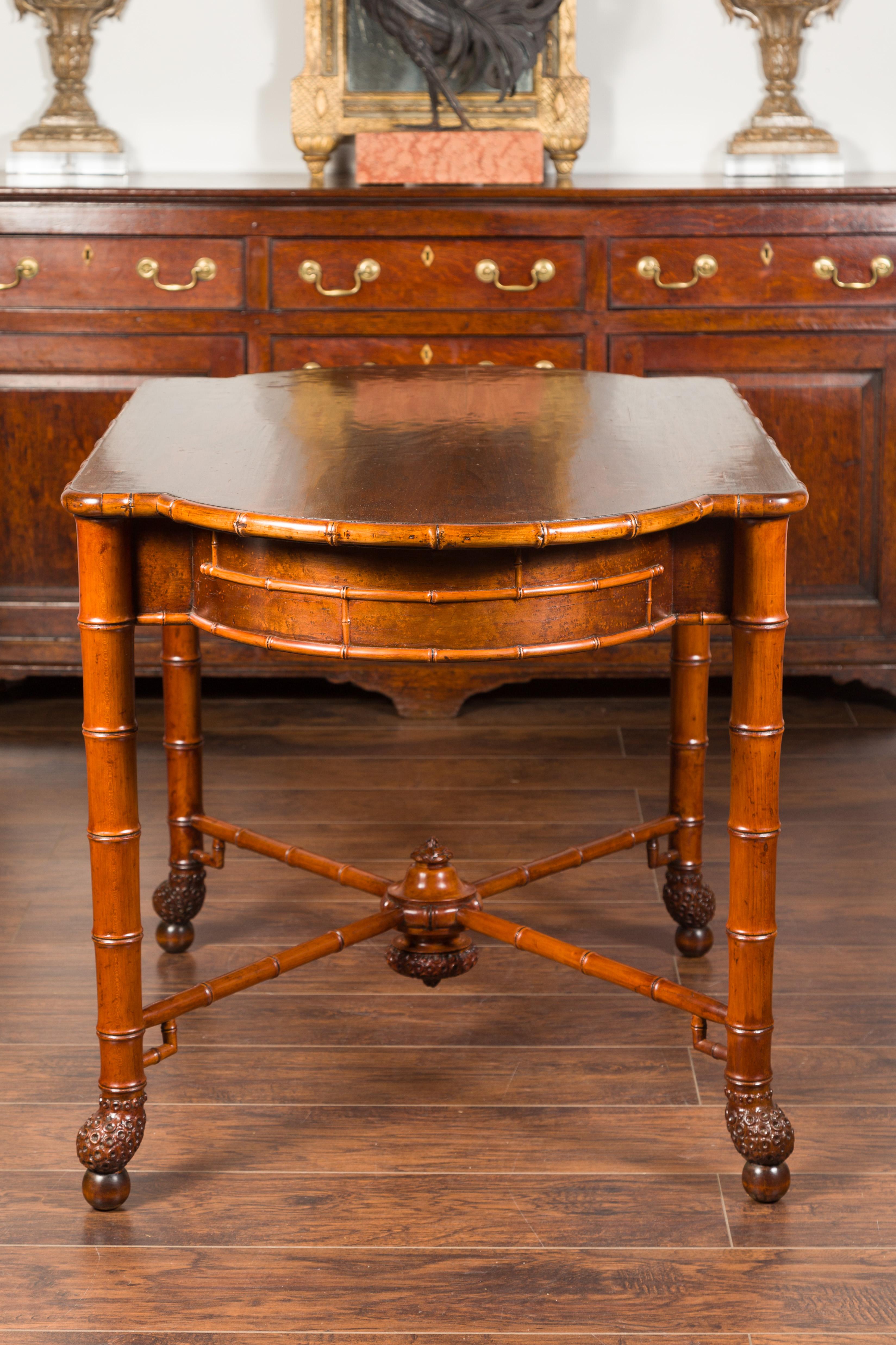 English 1870s Faux Bamboo Walnut Desk with Oval Top, Drawers and Root Style Feet For Sale 11