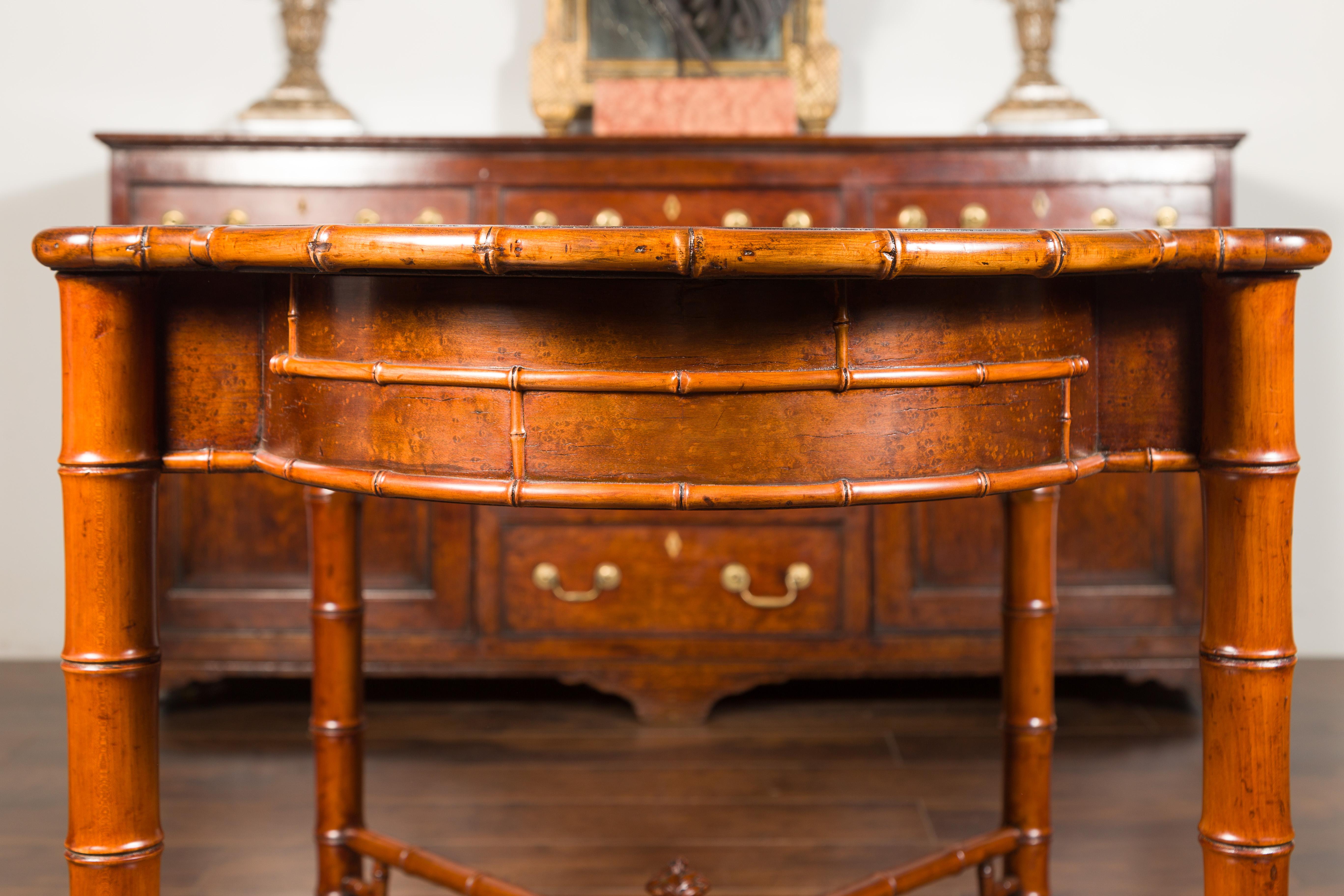 English 1870s Faux Bamboo Walnut Desk with Oval Top, Drawers and Root Style Feet For Sale 14