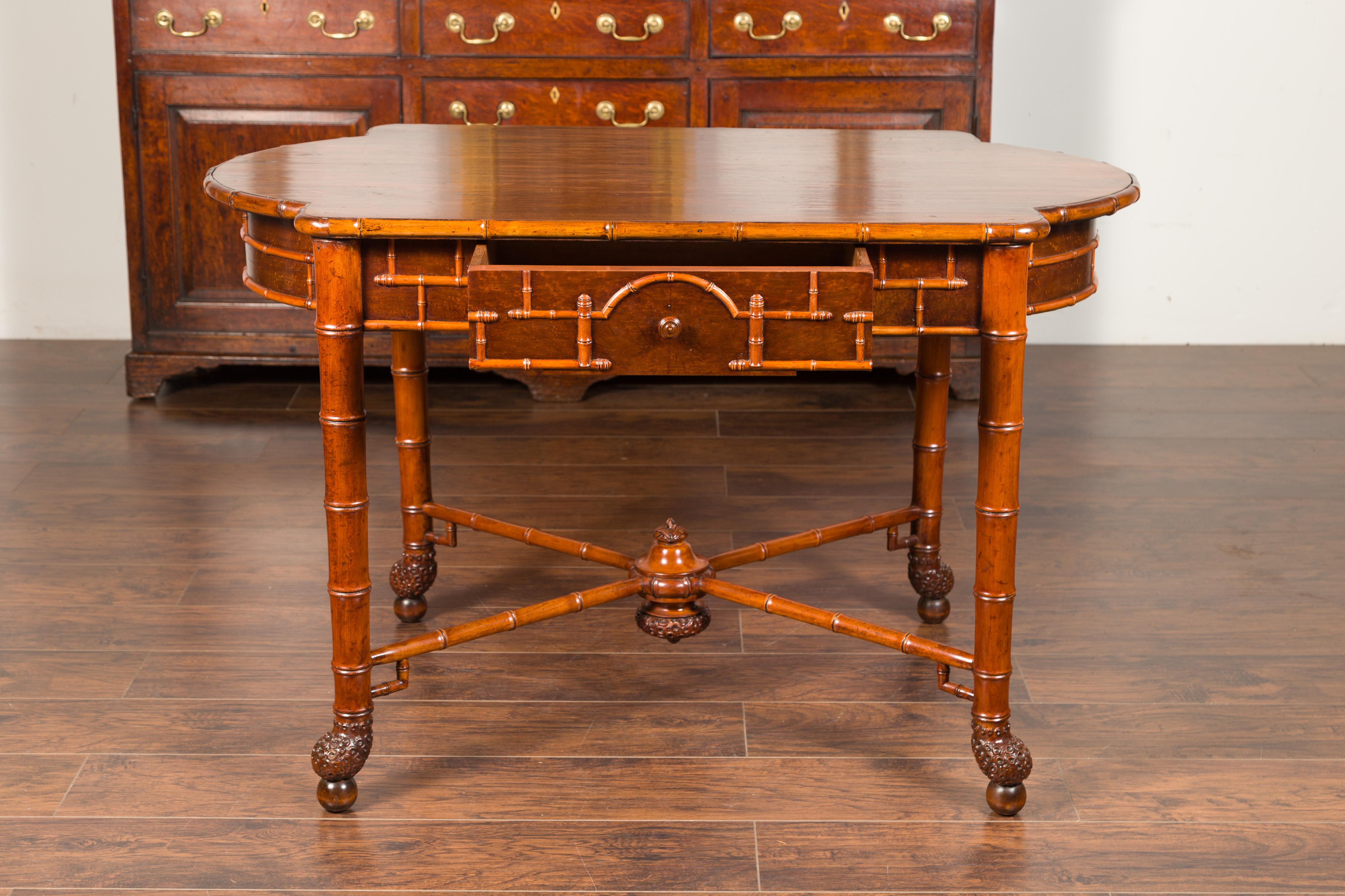 English 1870s Faux Bamboo Walnut Desk with Oval Top, Drawers and Root Style Feet For Sale 15