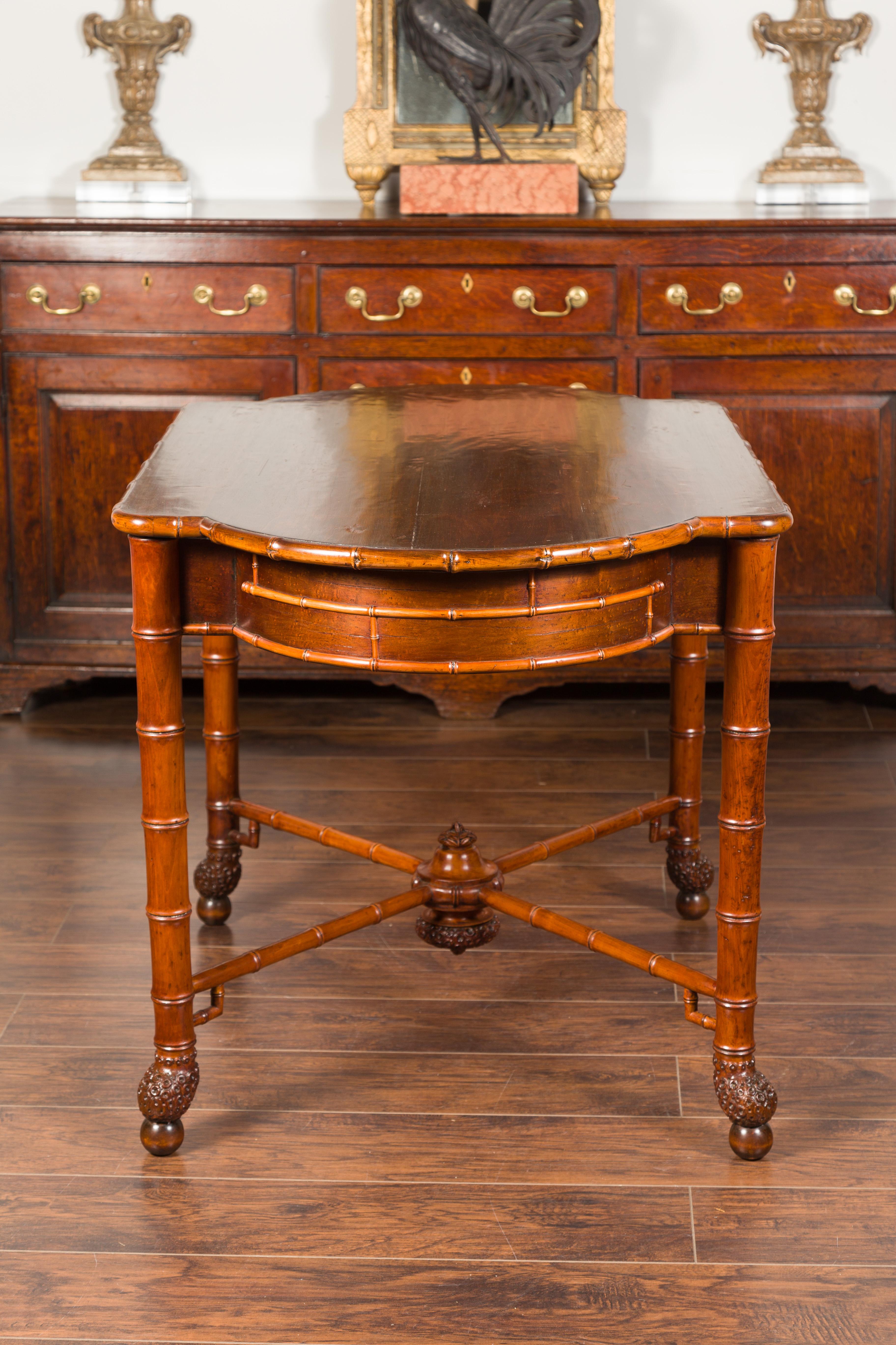 English 1870s Faux Bamboo Walnut Desk with Oval Top, Drawers and Root Style Feet For Sale 16