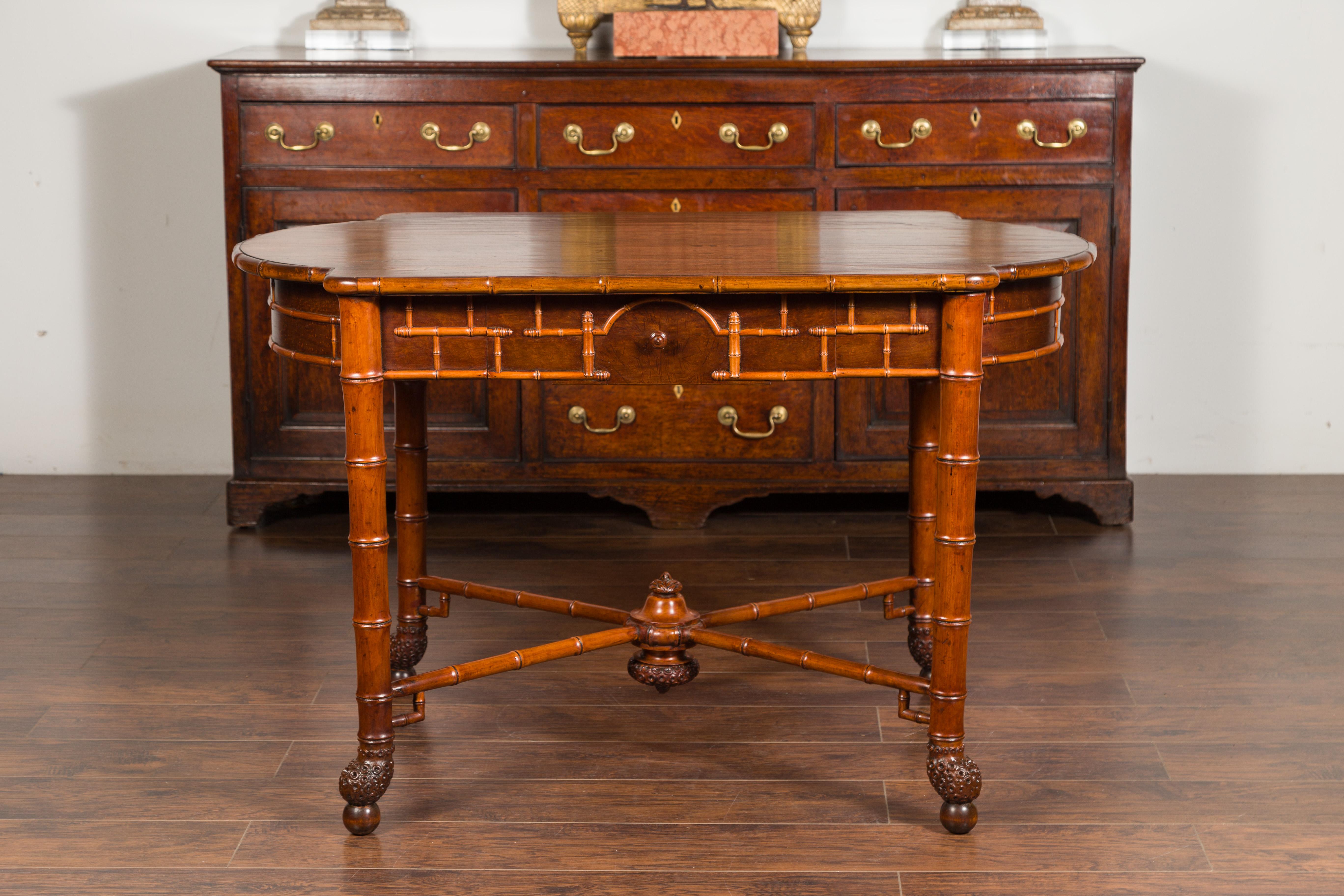 English 1870s Faux Bamboo Walnut Desk with Oval Top, Drawers and Root Style Feet For Sale 1