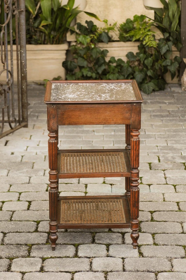 English 1870s Mahogany Étagère with Cane Shelves, Marble Top and Reeded Legs 8
