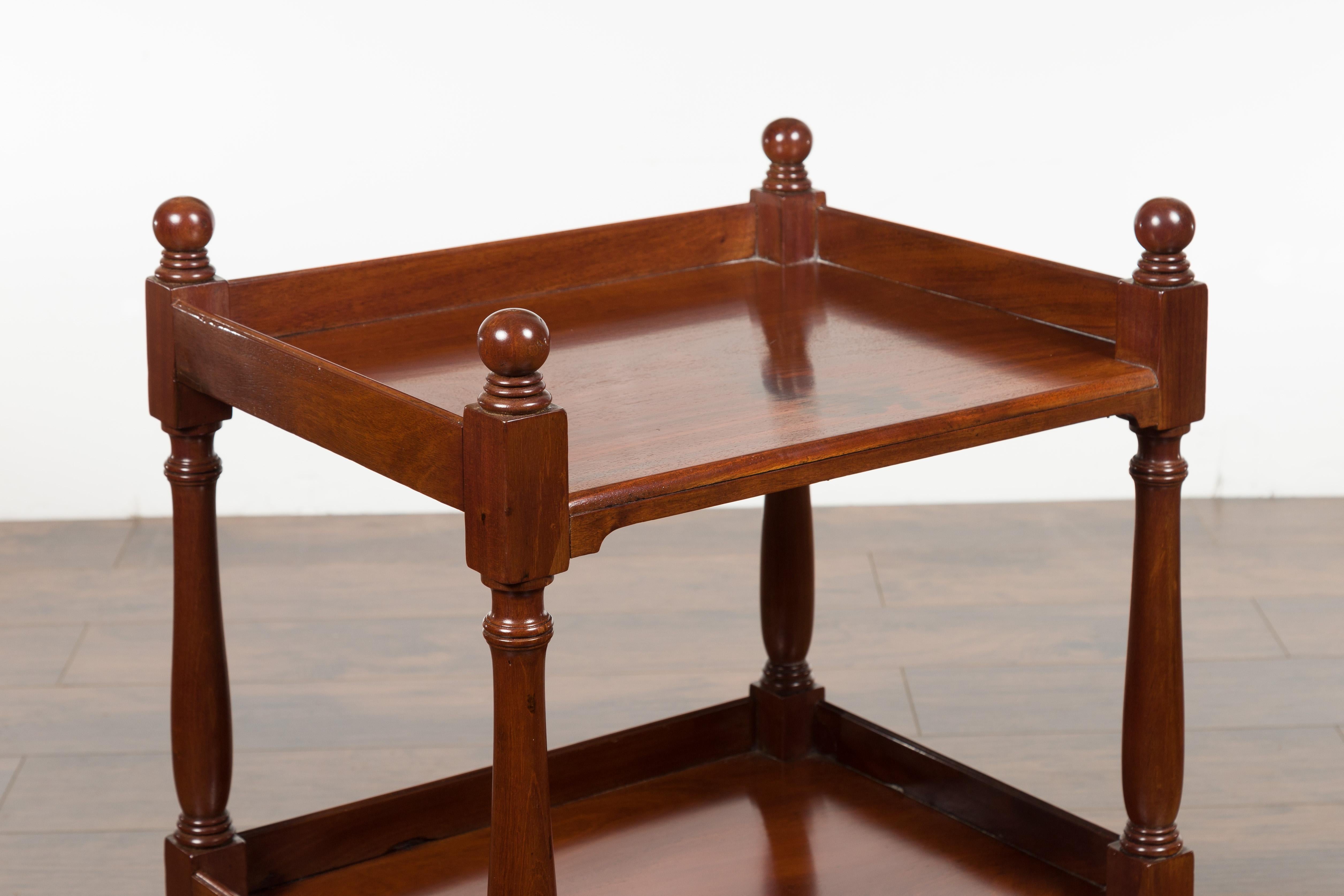 English 1870s Mahogany Tiered Table with Turned Legs and Low Shelf and Finials 7