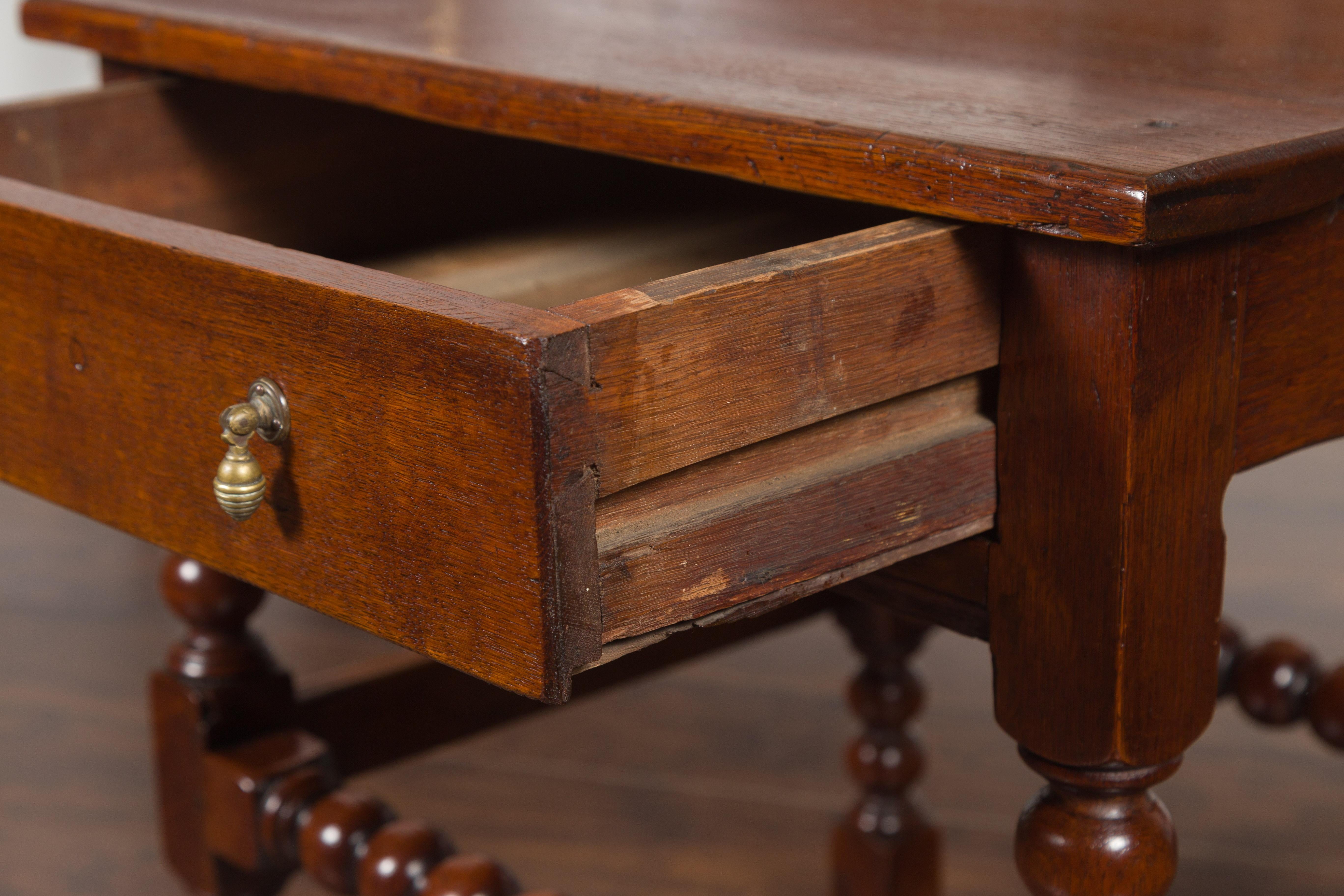 English 1870s Oak Bobbin Leg Side Table with Single Drawer and Stretchers For Sale 3