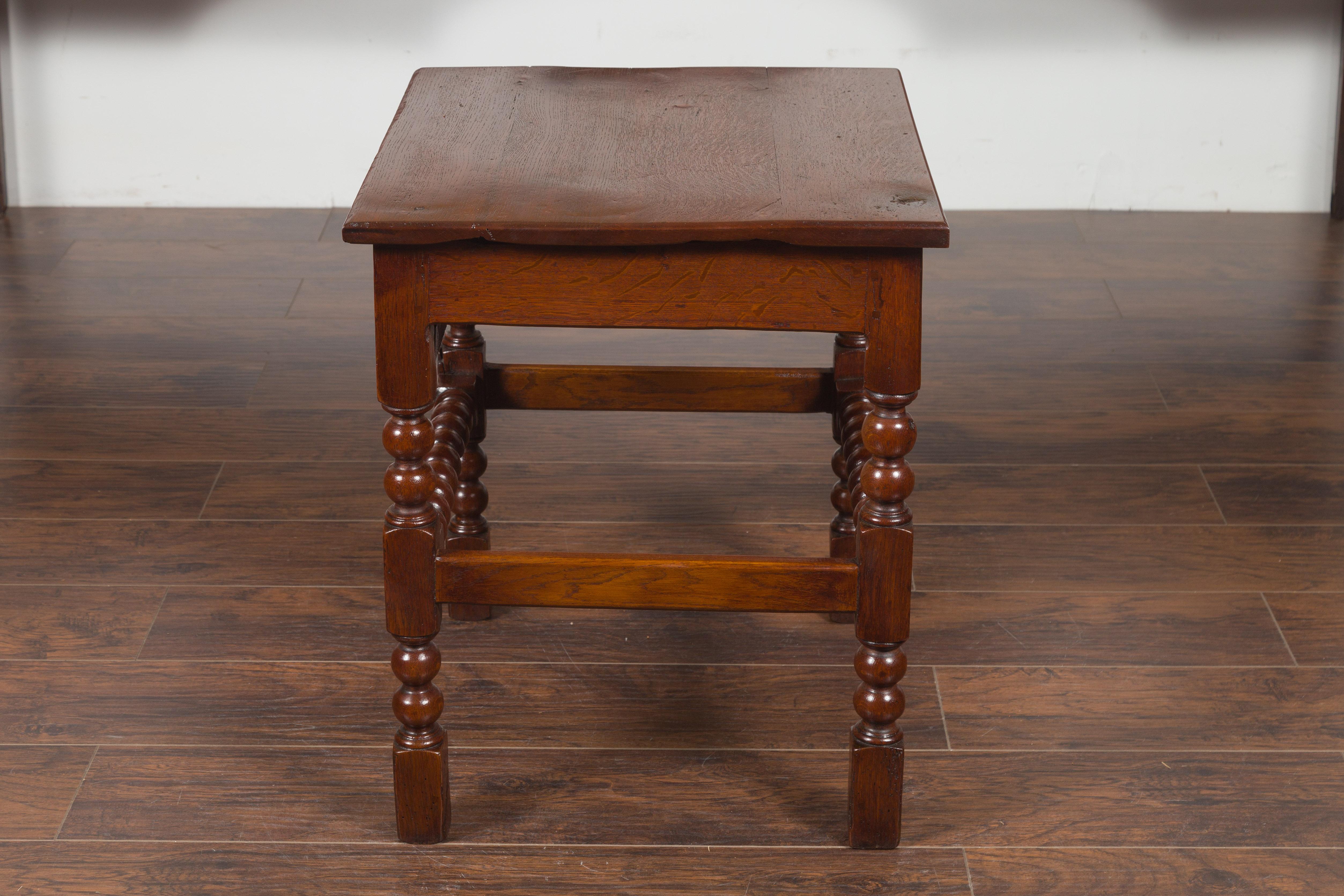 English 1870s Oak Bobbin Leg Side Table with Single Drawer and Stretchers For Sale 4