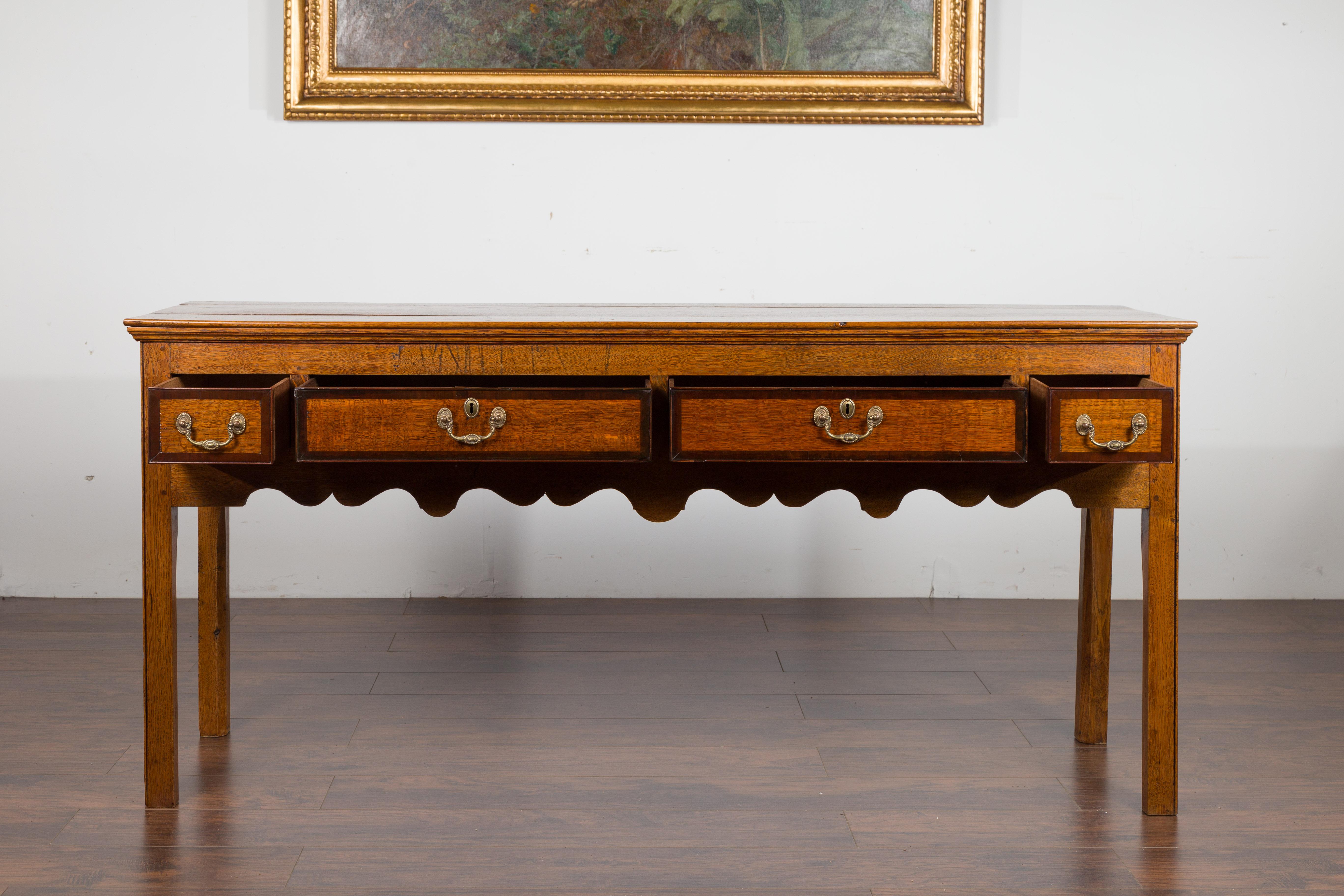 English 1870s Oak Dresser Base with Two-Toned Drawers and Scalloped Apron 4