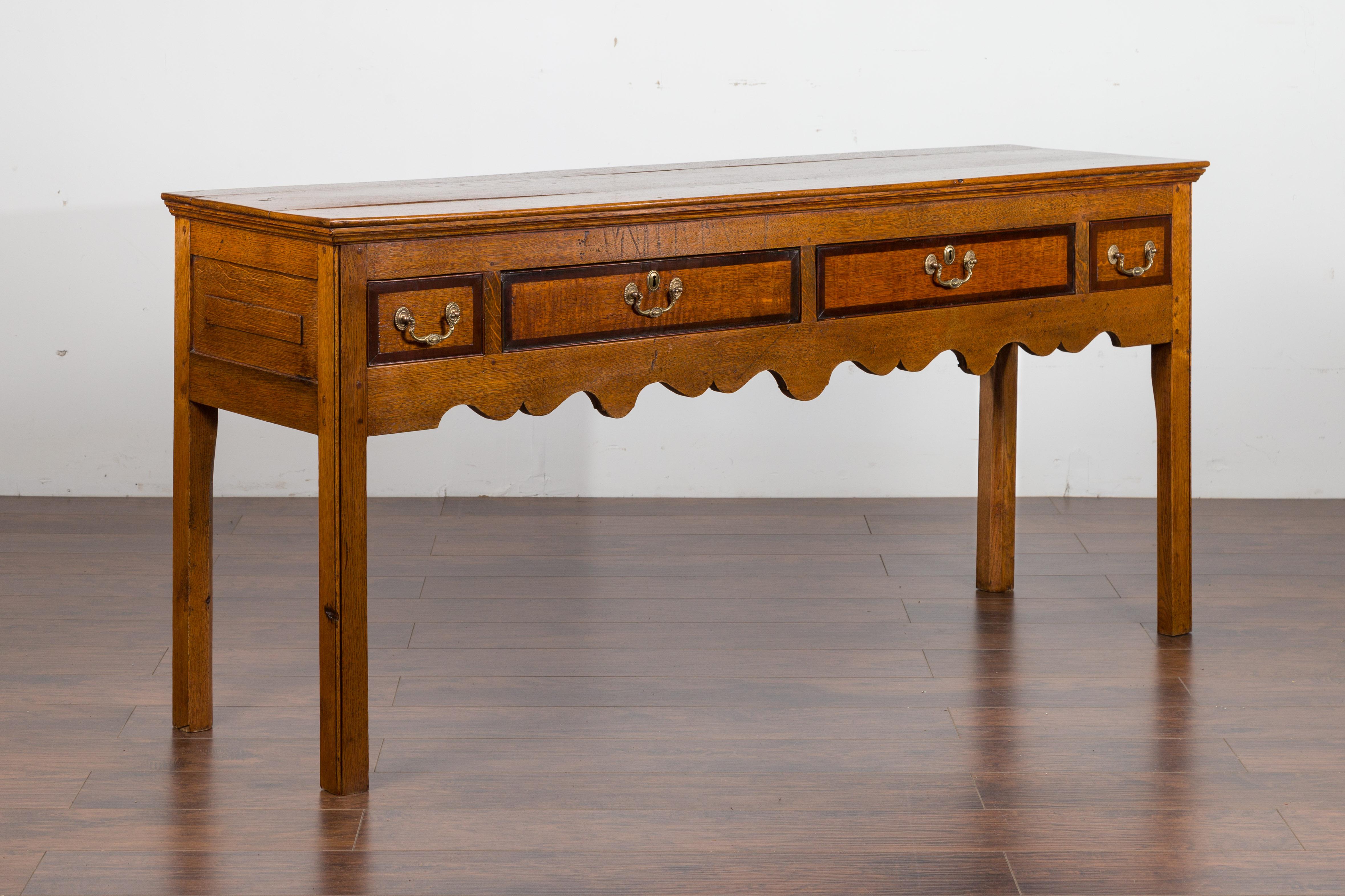 English 1870s Oak Dresser Base with Two-Toned Drawers and Scalloped Apron 5