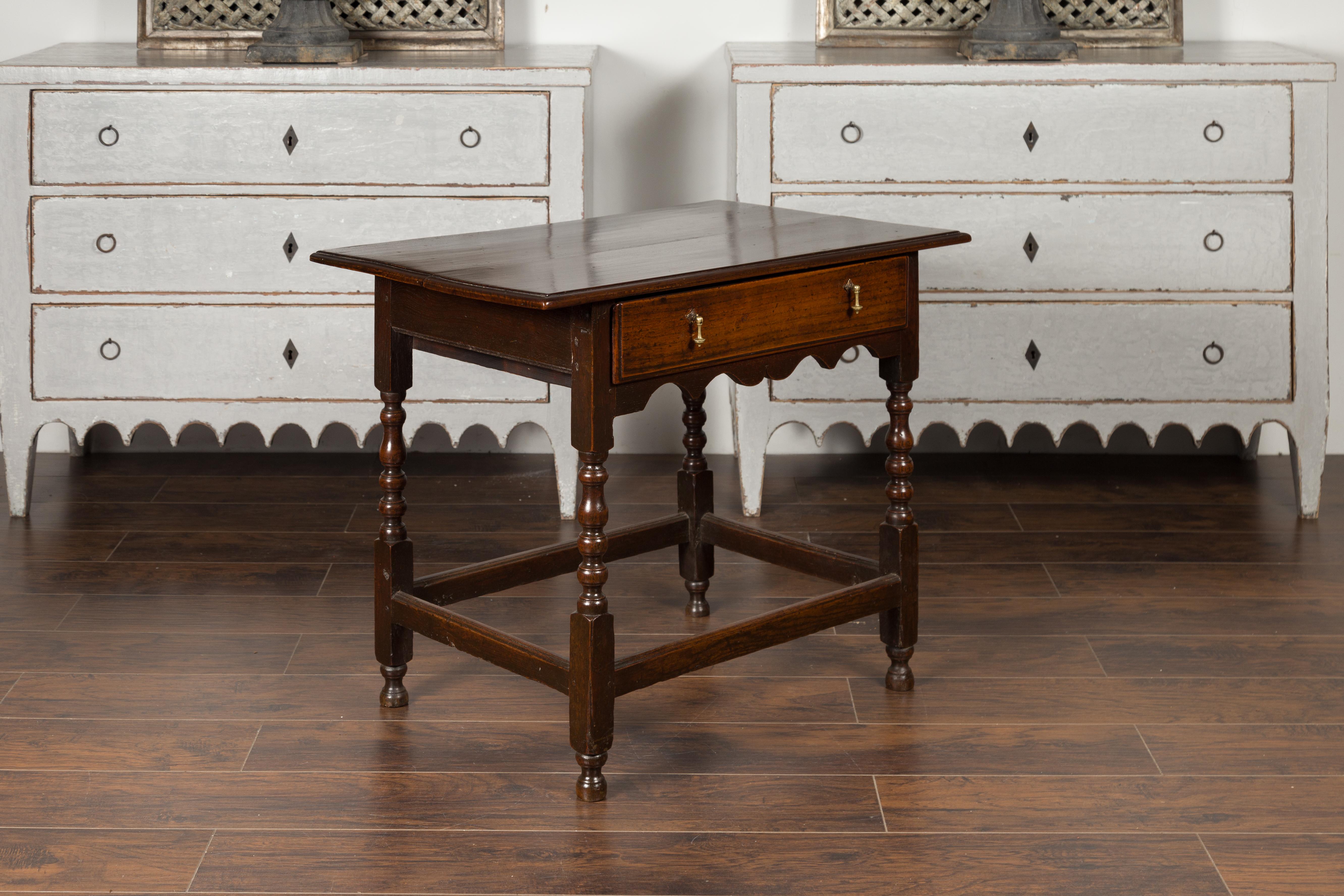 English 1870s Oak Side Table with Single Drawer, Turned Legs and Carved Apron 2