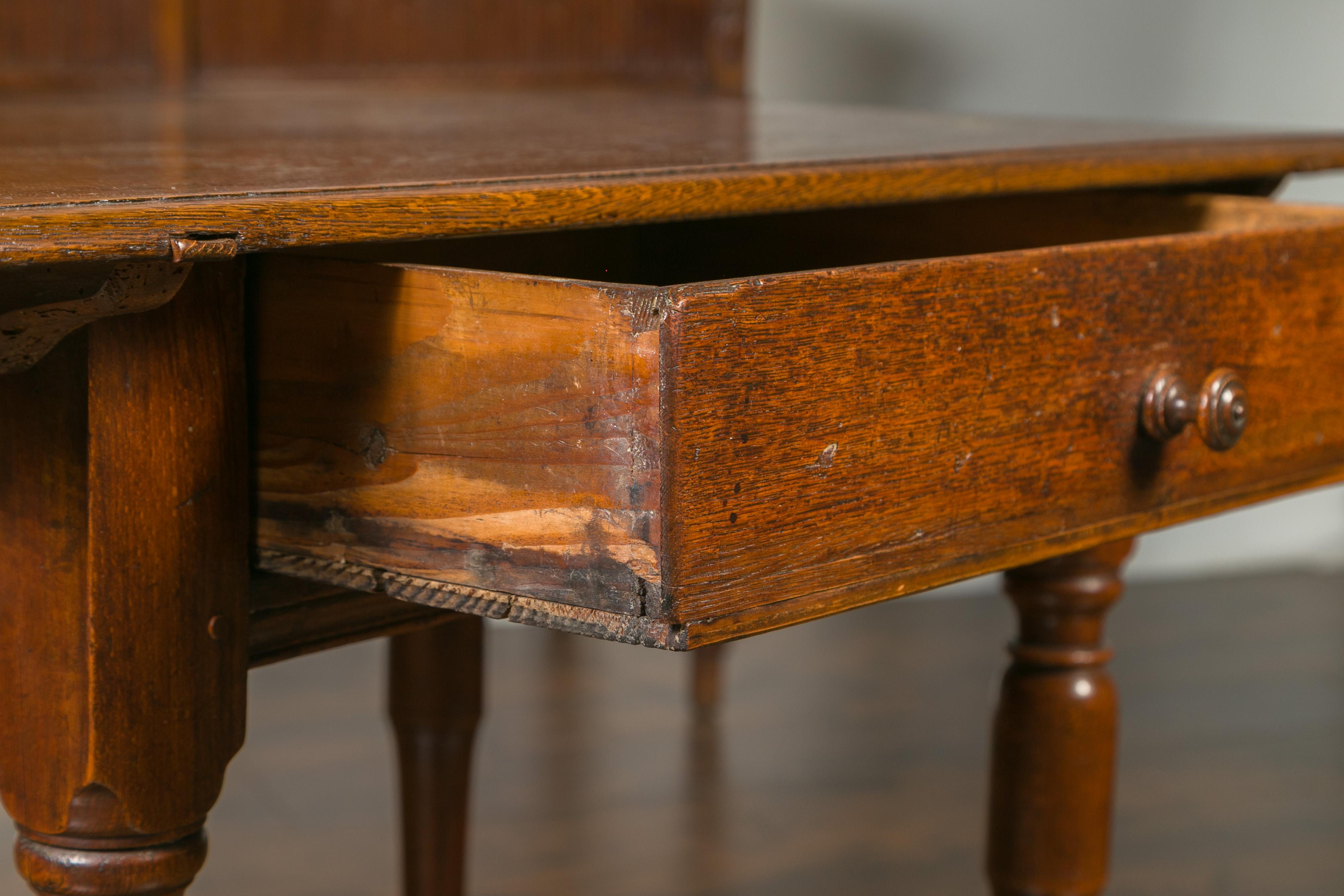 English 1870s Oak Side Table with Single Drawer, Turned Legs and Cross Stretcher 7