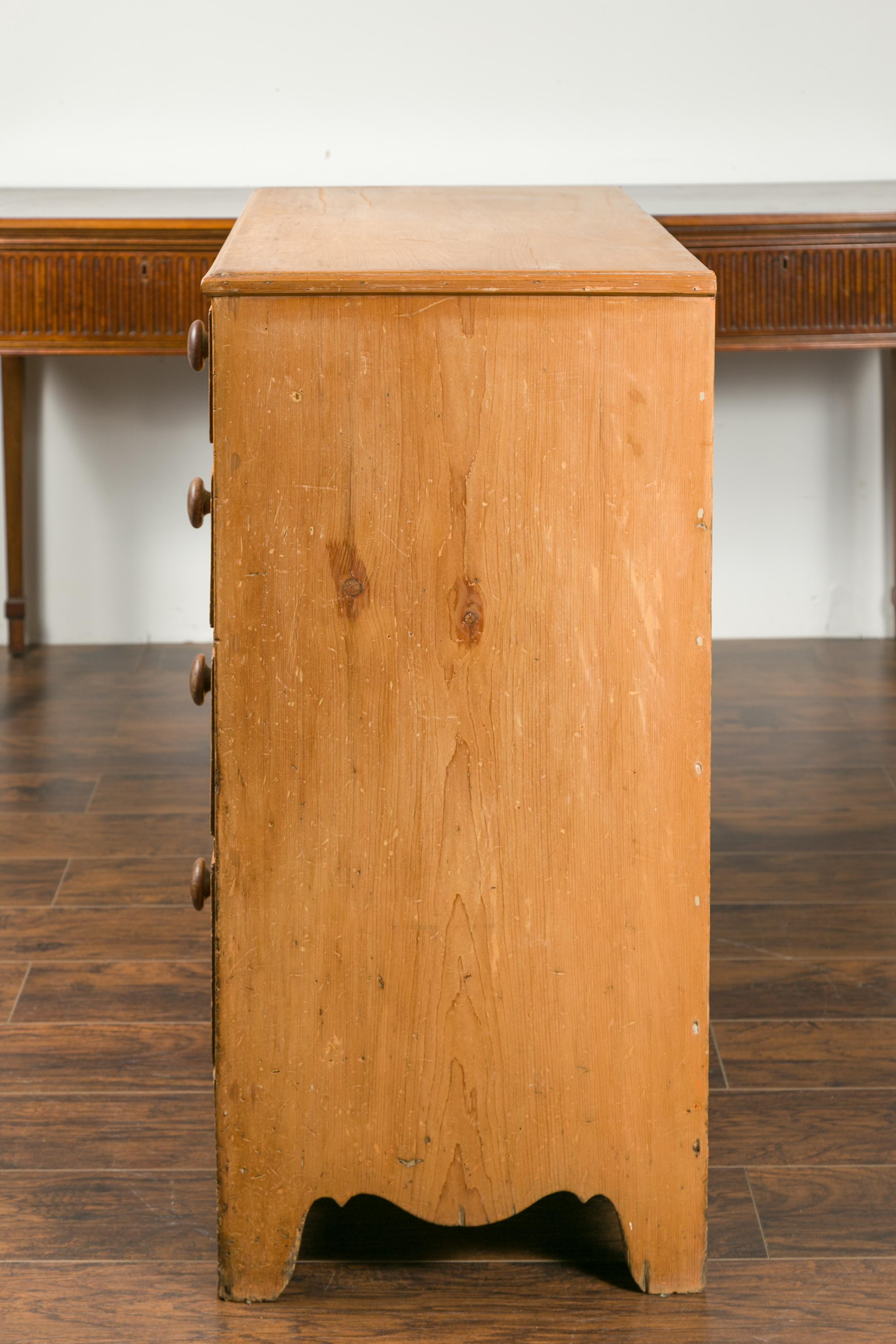 English 1870s Pine Five-Drawer Chest with Valanced Apron and Wooden Pulls 2