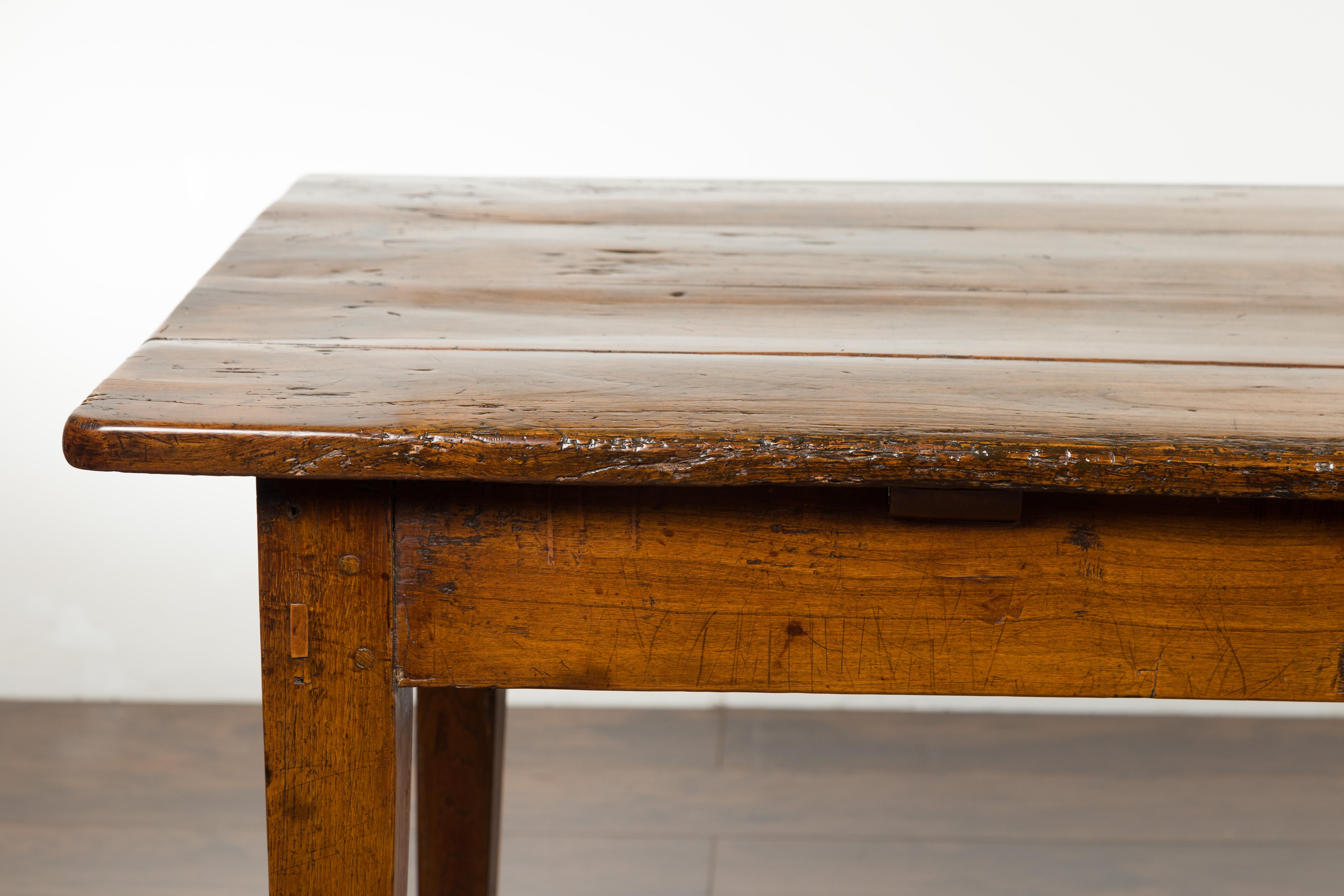 19th Century English 1870s Rustic Elm Farm Table with Single Drawer and Tapered Legs