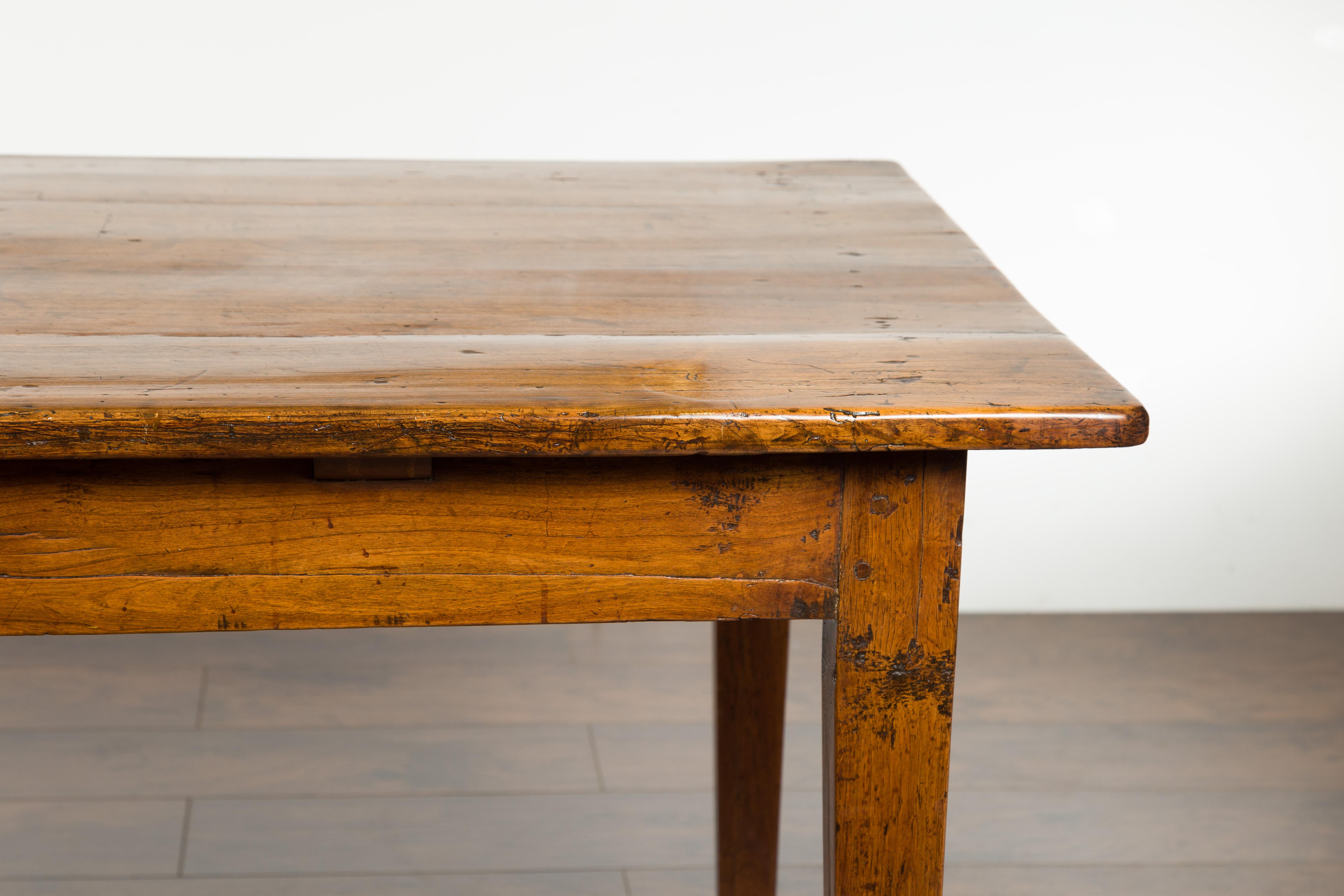 English 1870s Rustic Elm Farm Table with Single Drawer and Tapered Legs 1