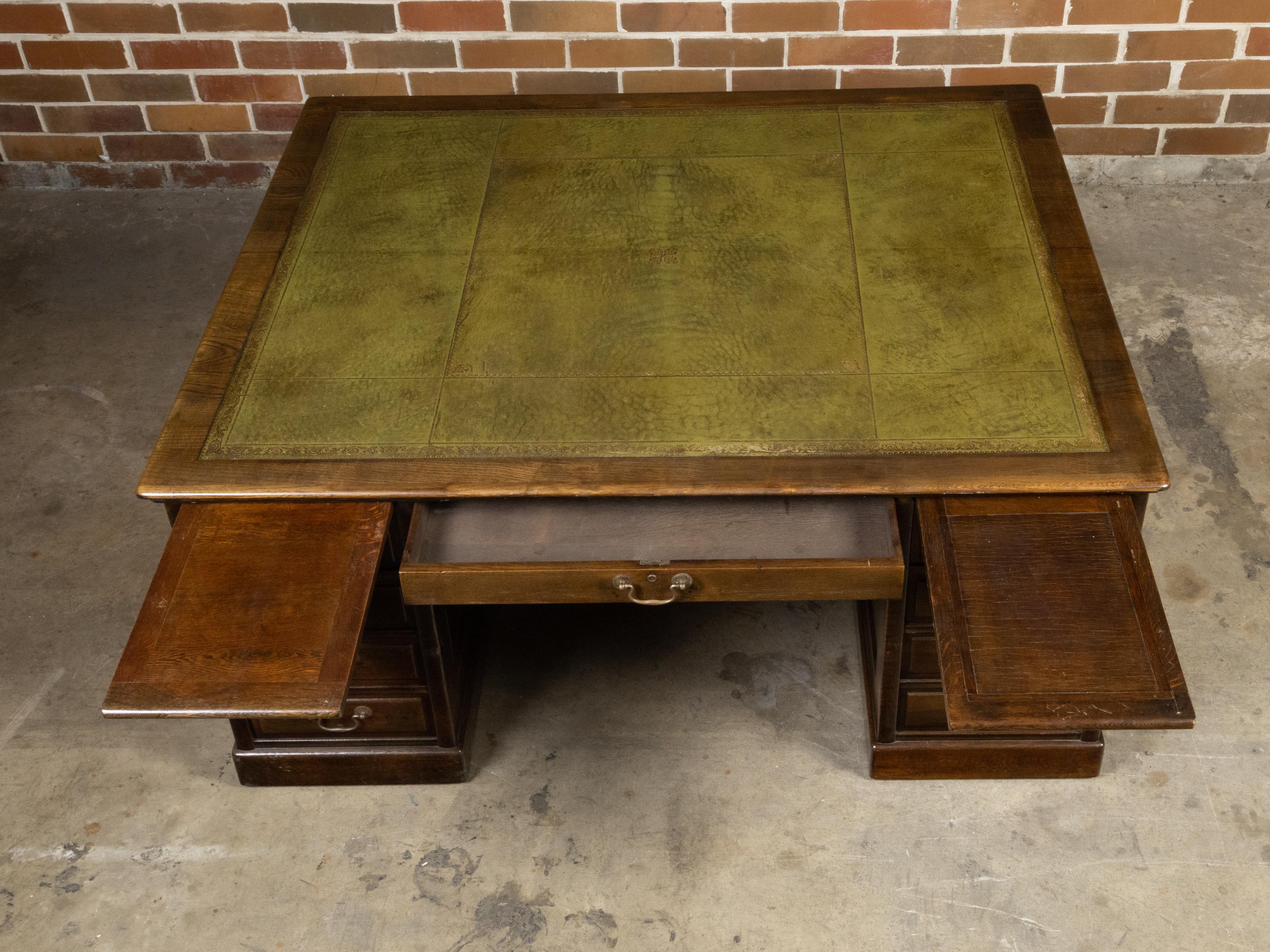 English 1870s Wood and Green Leather Partner's Desk with Multiple Drawers For Sale 1