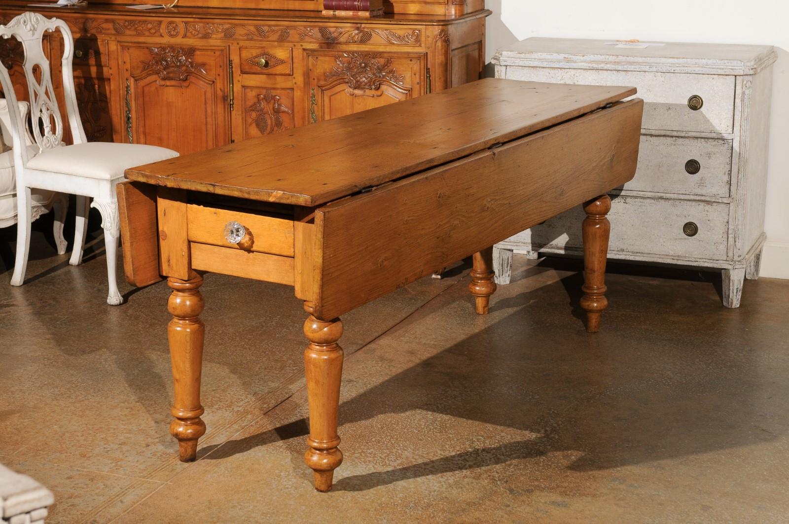 English 1875s Pine Drop Leaf Table with Two Lateral Drawers and Turned Legs For Sale 1