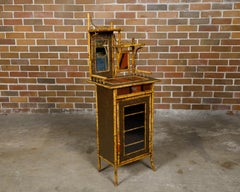 English 1880s Bamboo Small Cabinet with Painted Accents and Single Mirror