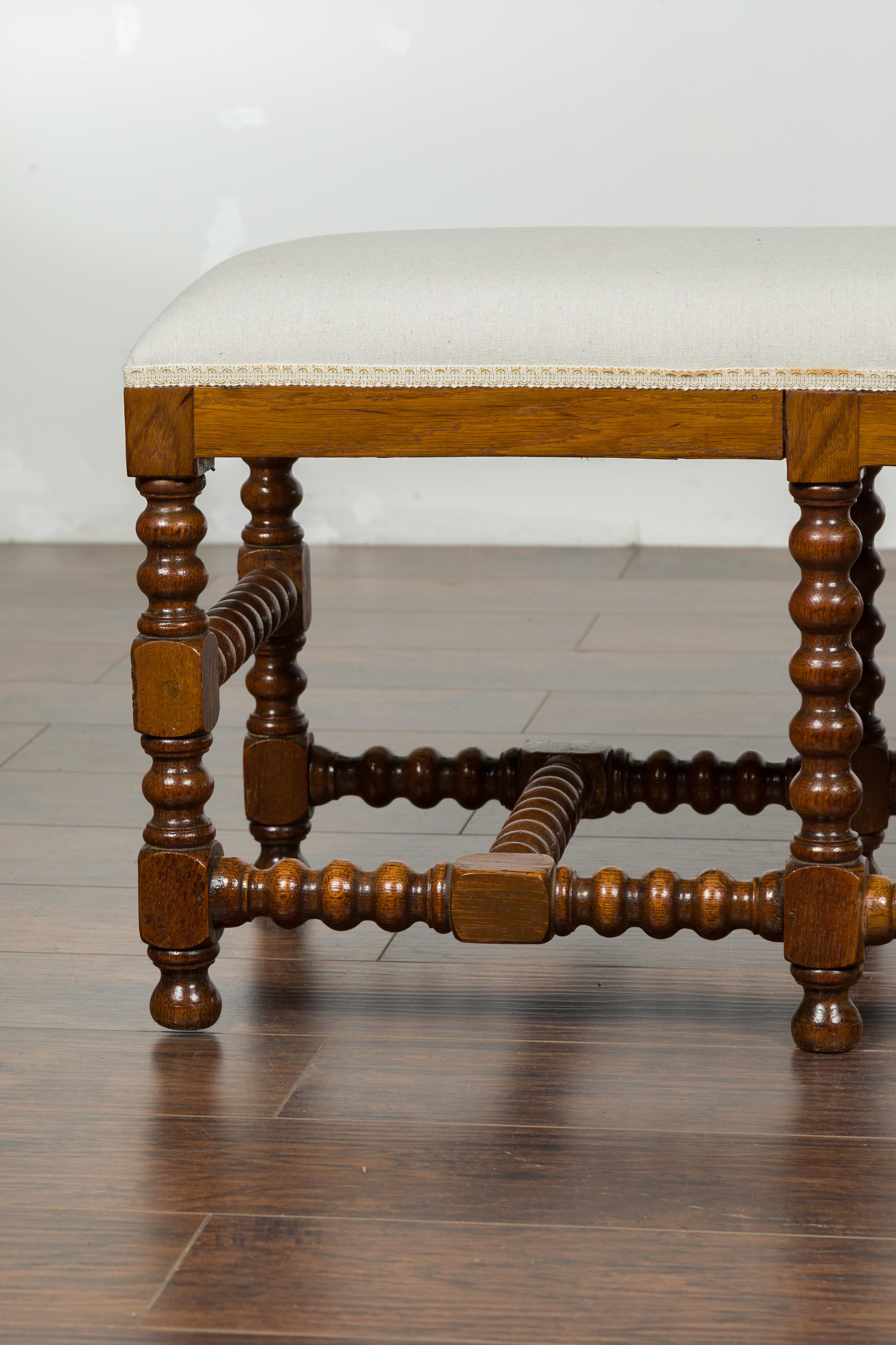 English 1880s Bobbin Leg Bench with Cross Stretchers and New Upholstery In Good Condition In Atlanta, GA