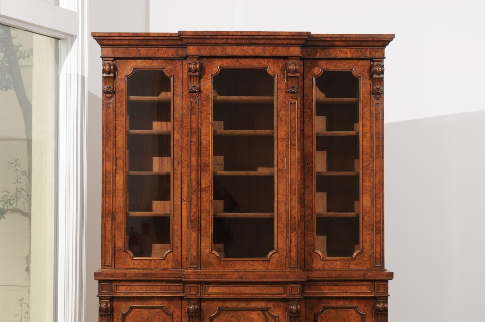 walnut bookcase with glass doors