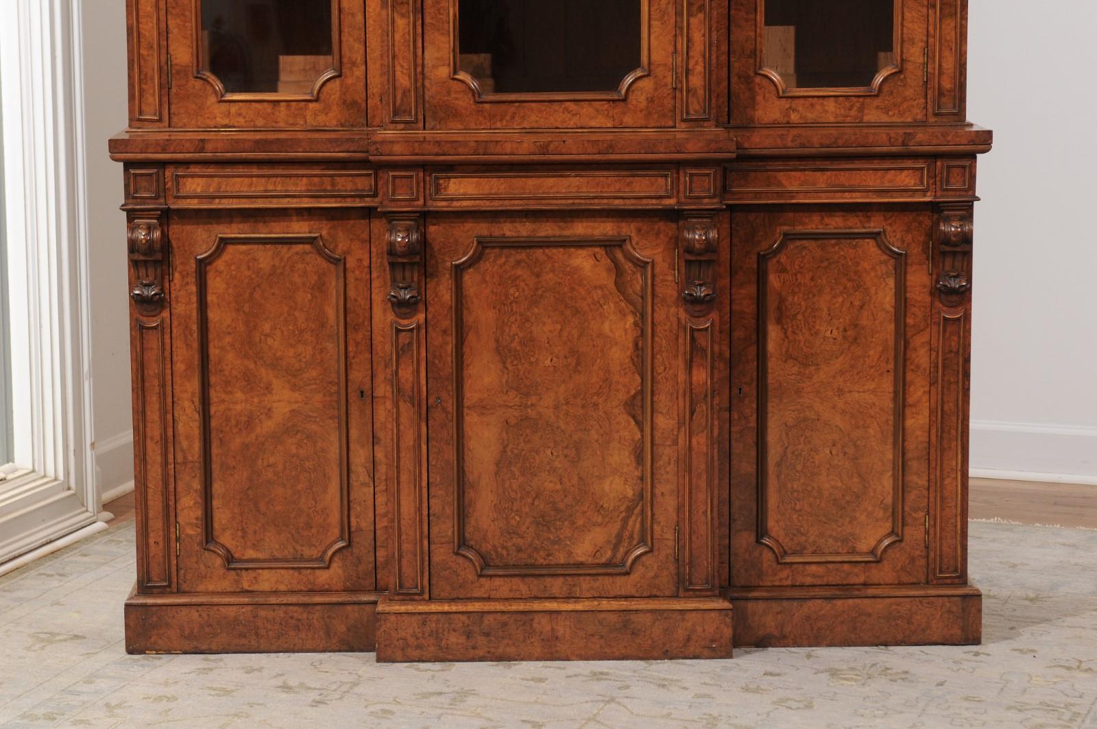 English 1880s Burled Walnut Breakfront Bookcase with Glass Doors and Volutes In Good Condition In Atlanta, GA