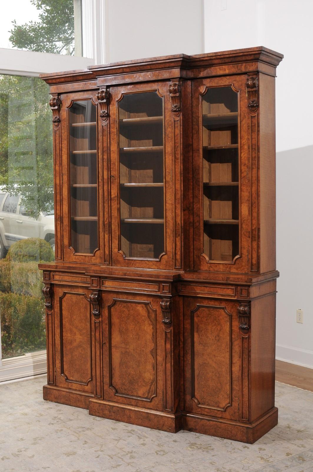 19th Century English 1880s Burled Walnut Breakfront Bookcase with Glass Doors and Volutes