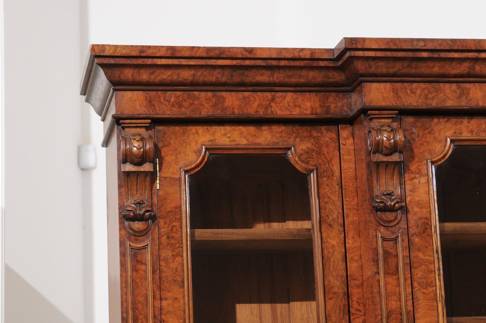 English 1880s Burled Walnut Breakfront Bookcase with Glass Doors and Volutes 3