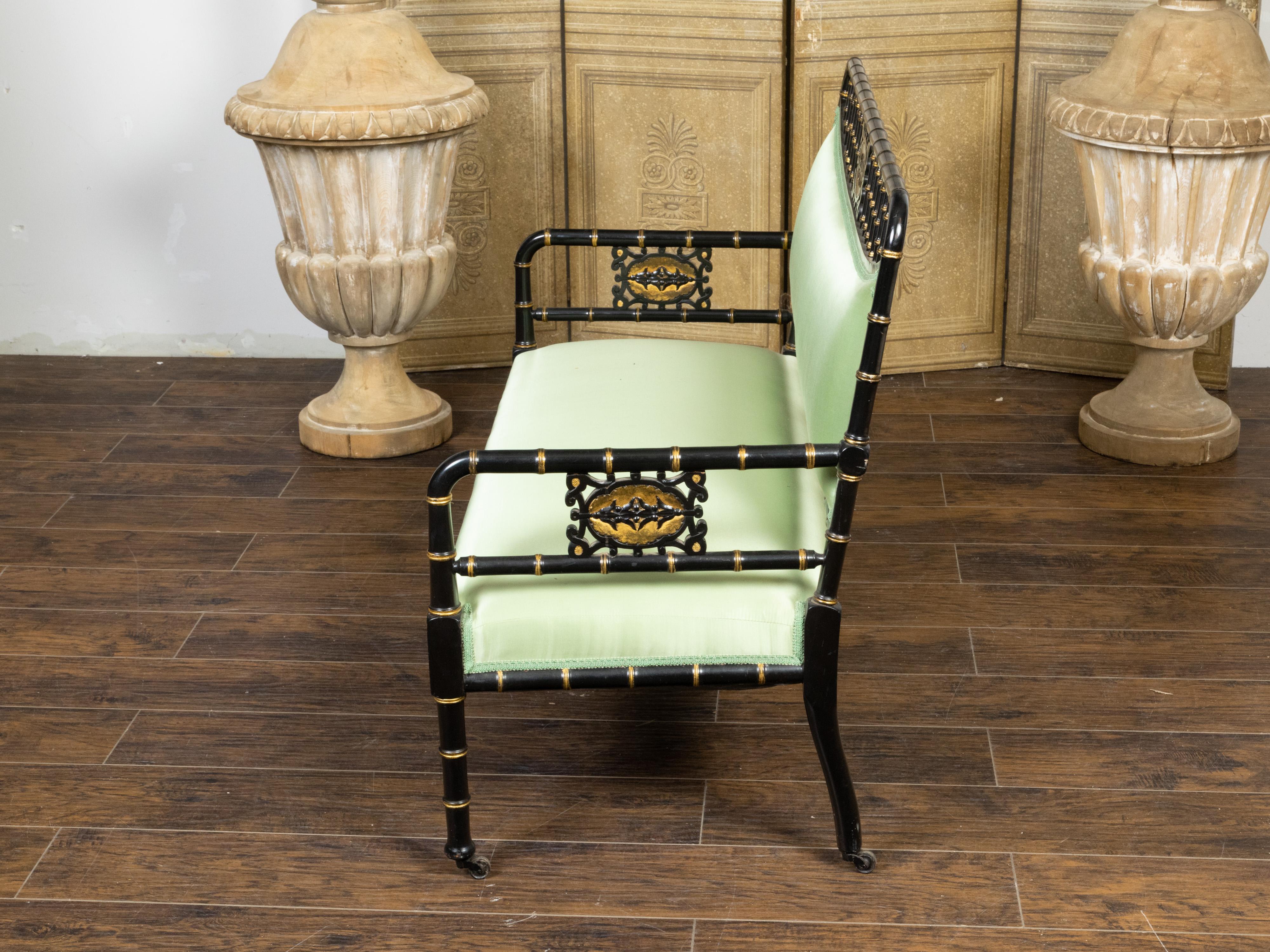 19th Century English 1880s Ebonized Faux Bamboo Bench with Gilt Accents and Green Upholstery