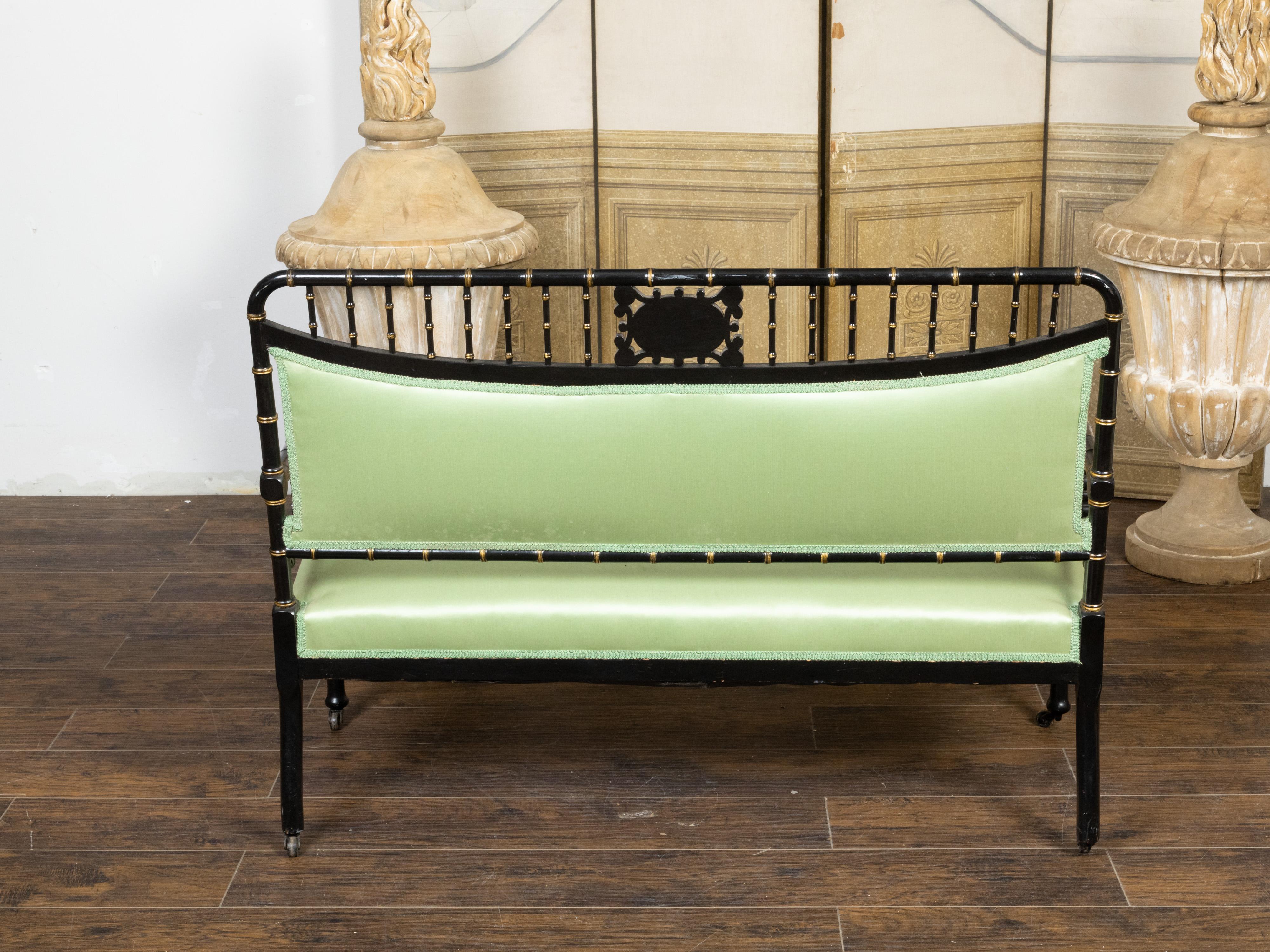 English 1880s Ebonized Faux Bamboo Bench with Gilt Accents and Green Upholstery 1