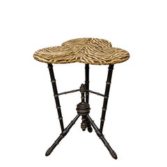 English 1880s Ebonized Faux Bamboo Side Table with Clover Leaf Upholstered Top