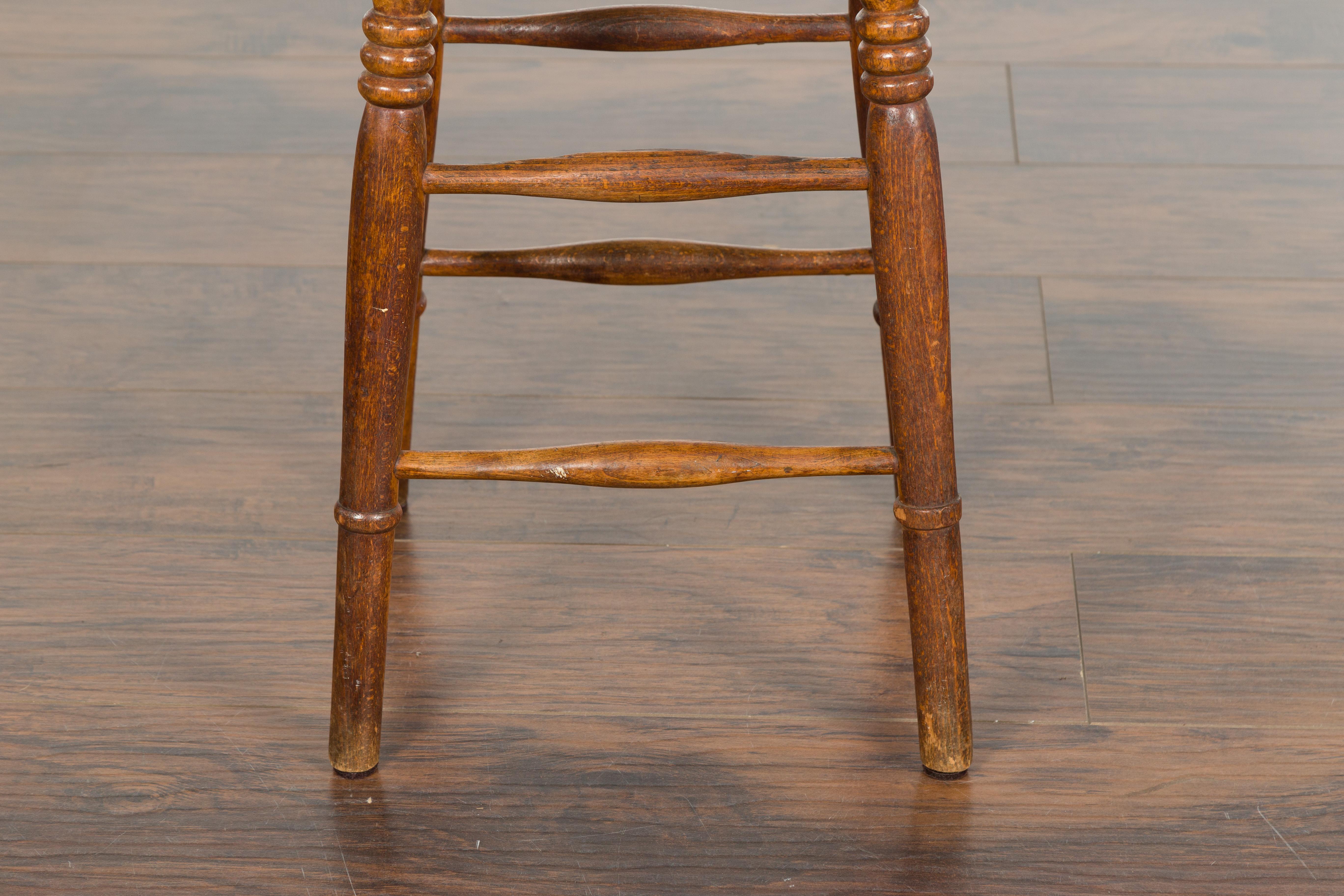 English 1880s Elm Stool with Oval Seat, Turned Splaying Legs and Side Stretchers 7