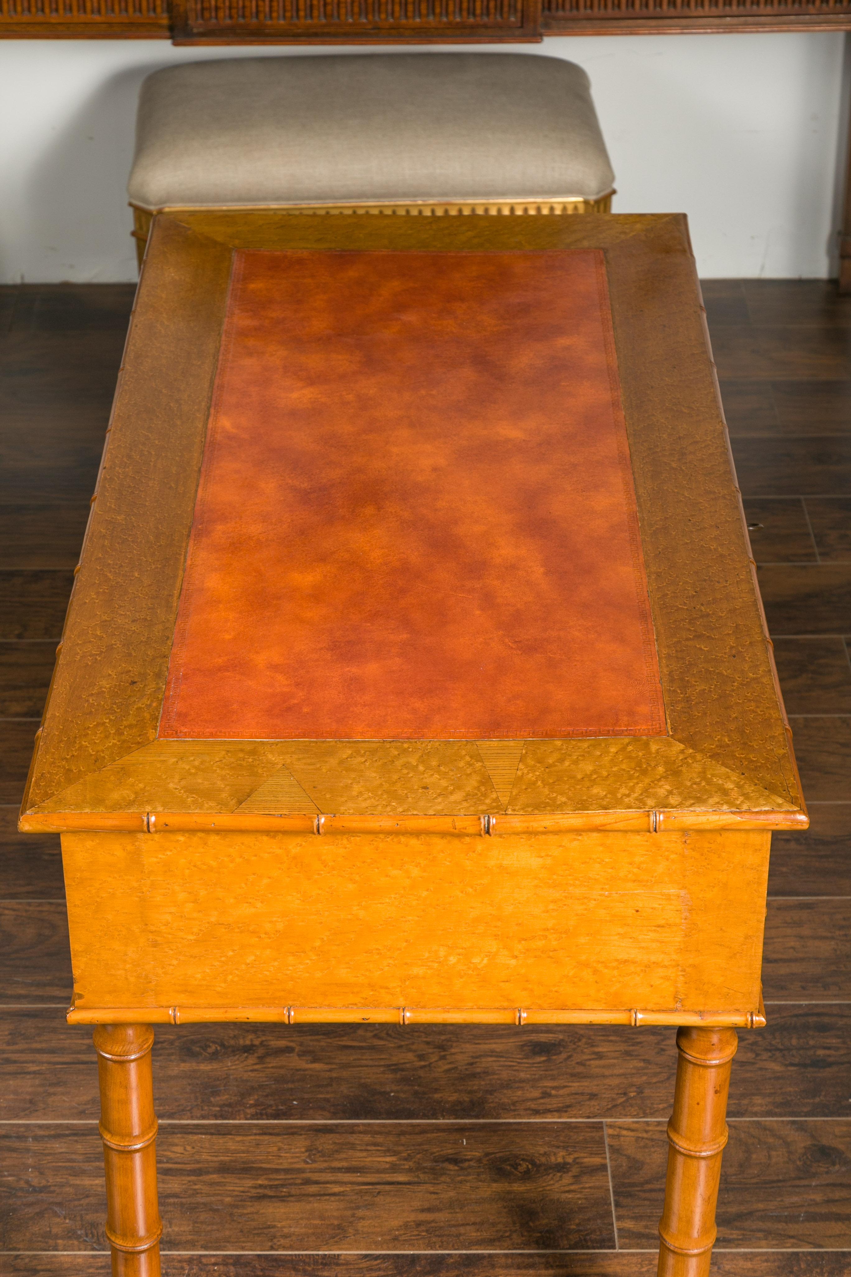 19th Century English 1880s Faux-Bamboo Desk with Copper Hued Leather Top and Five Drawers For Sale