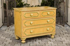 English 1880s Four-Drawer Goldenrod Chest with Green Painted Cartouche Motifs