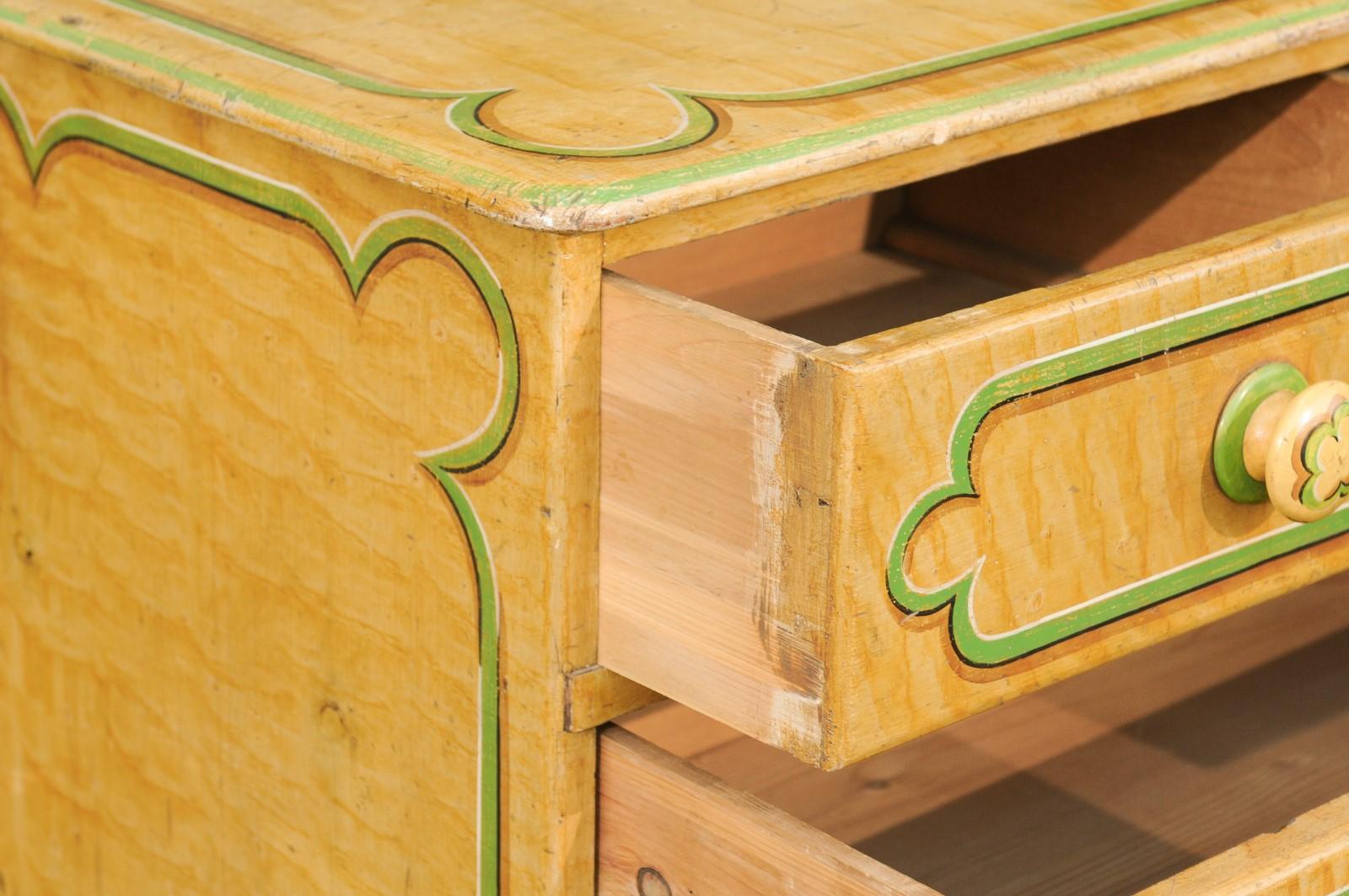 English 1880s Four-Drawer Goldenrod Chest with Green Painted Cartouche Motifs 1