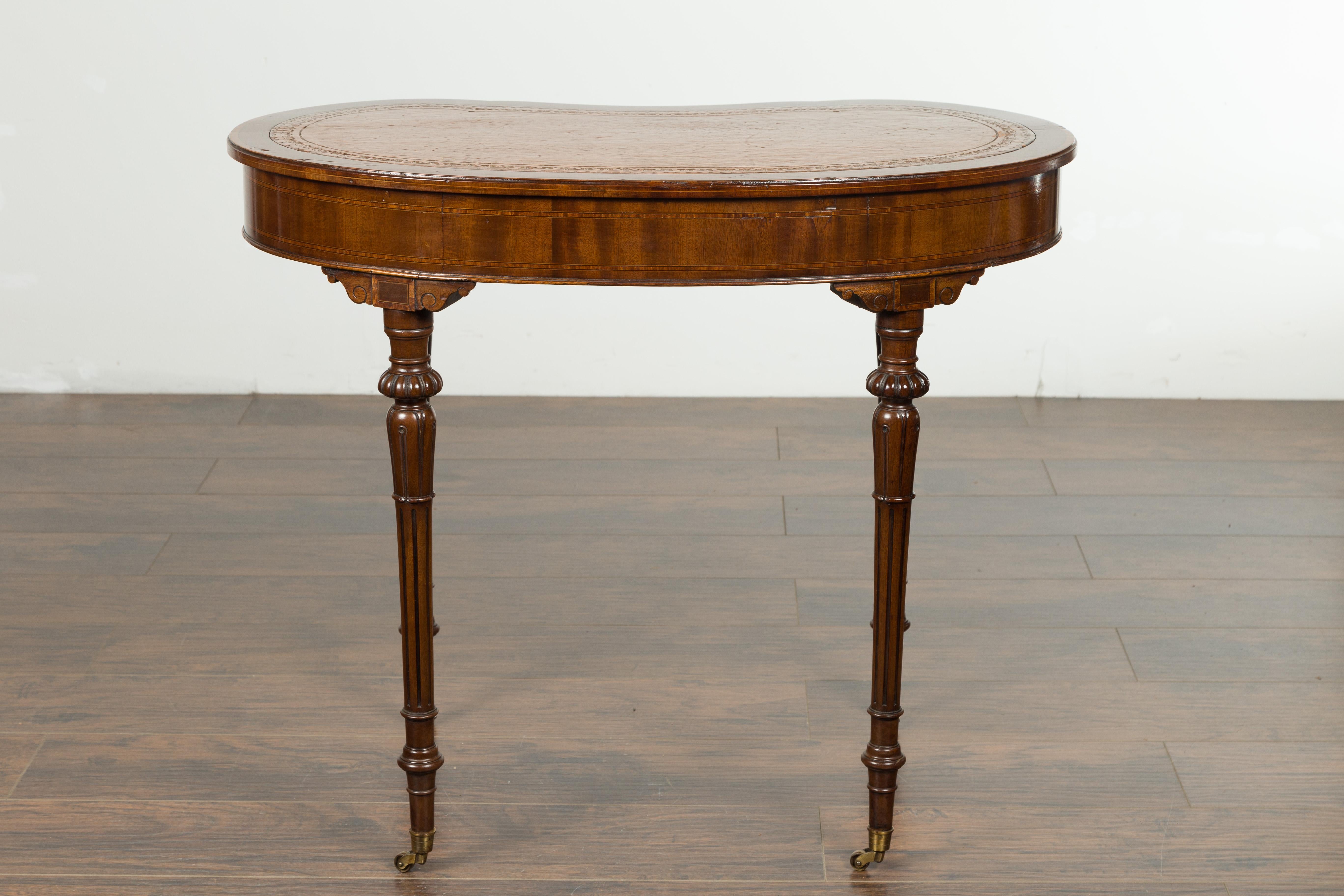 English 1880s Mahogany Kidney Table with Leather Top, Banding and Casters 14