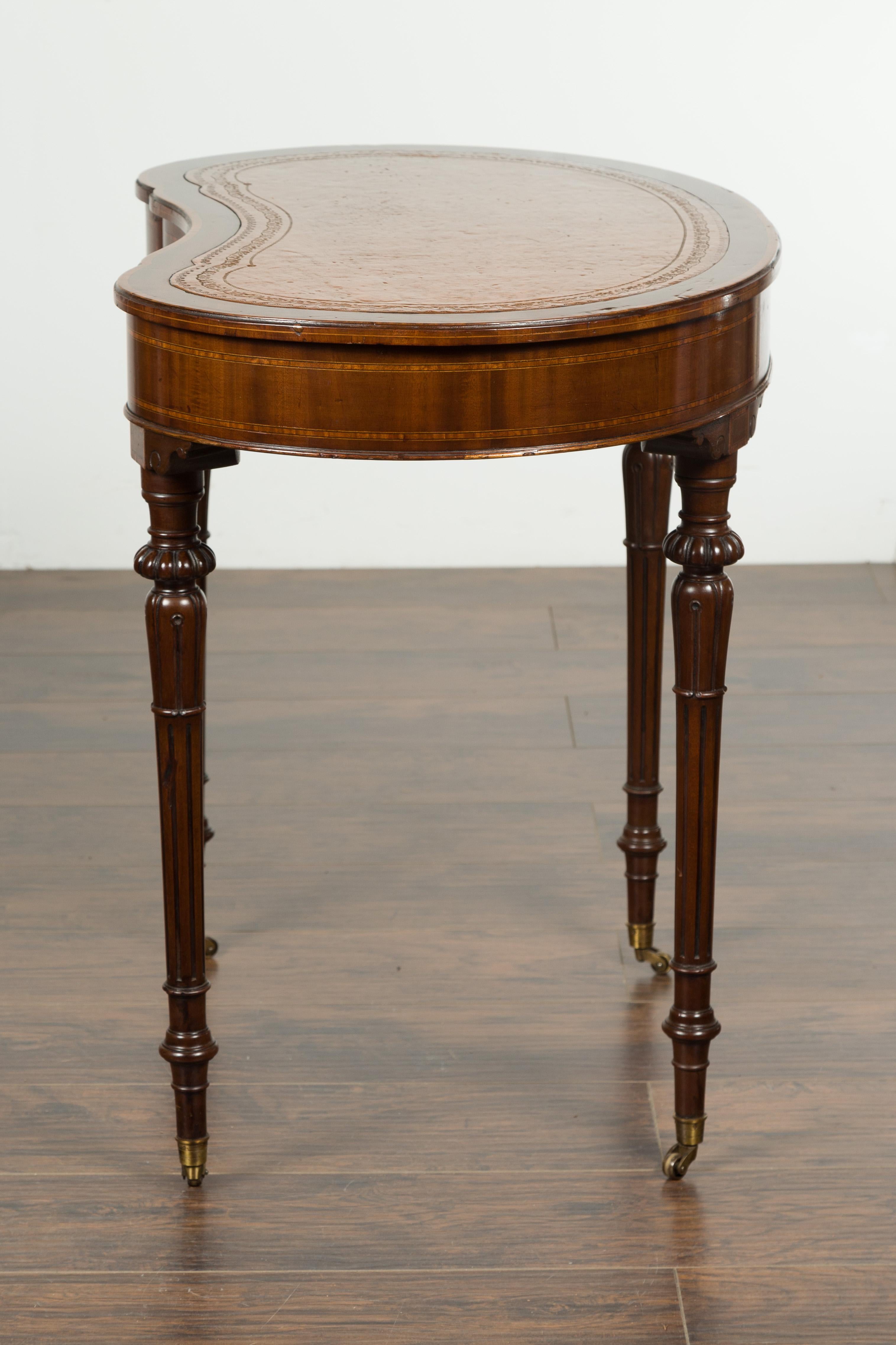 English 1880s Mahogany Kidney Table with Leather Top, Banding and Casters 15