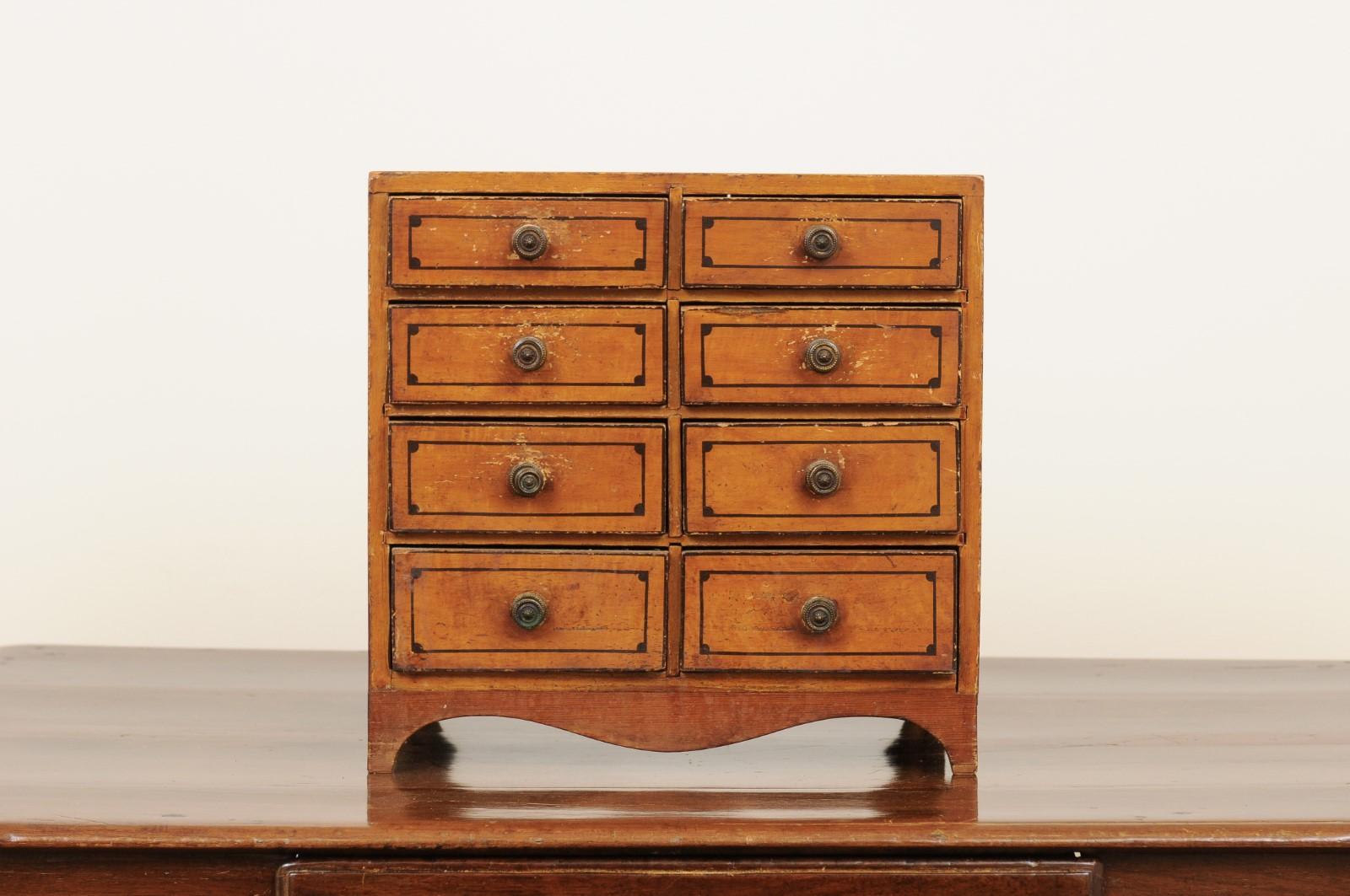 English 1880s Miniature Tabletop Chest with Eight Drawers and Valanced Skirt 6