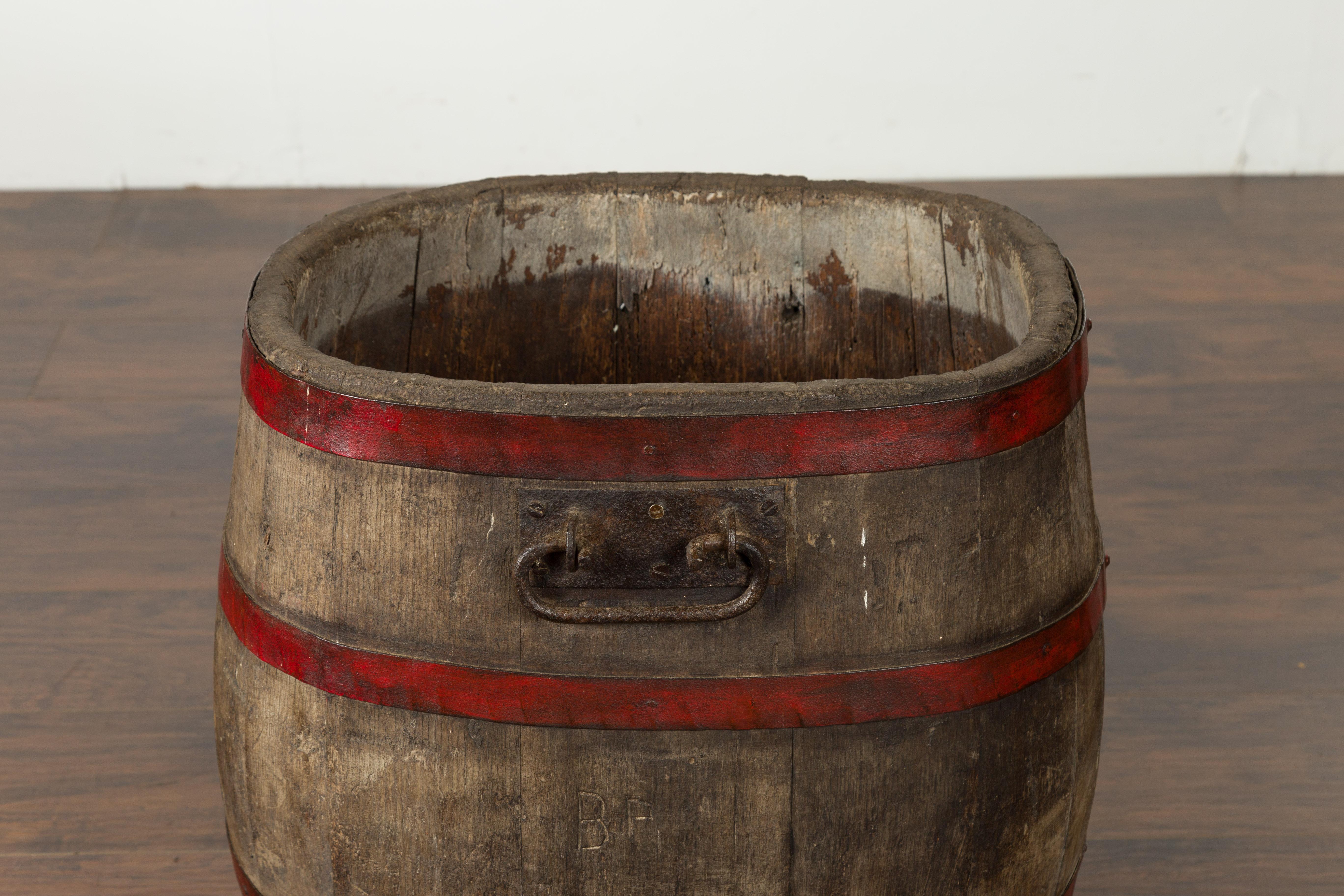 Rustic English 1880s Oak Barrel with Red Braces and Weathered Patina For Sale