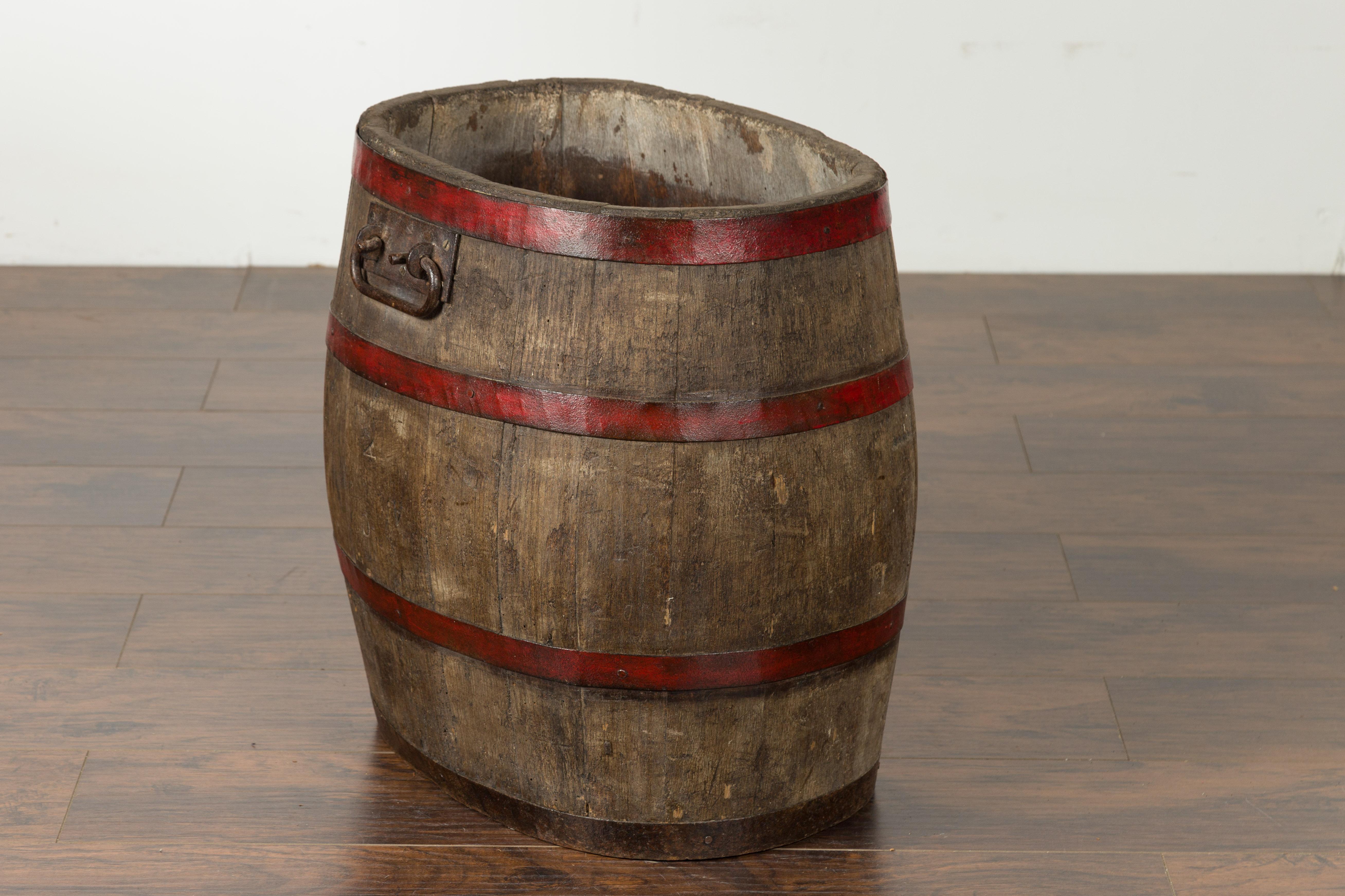 English 1880s Oak Barrel with Red Braces and Weathered Patina For Sale 3