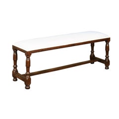 English 1880s Oak Bench with Turned Legs, Cross Stretcher and New Upholstery