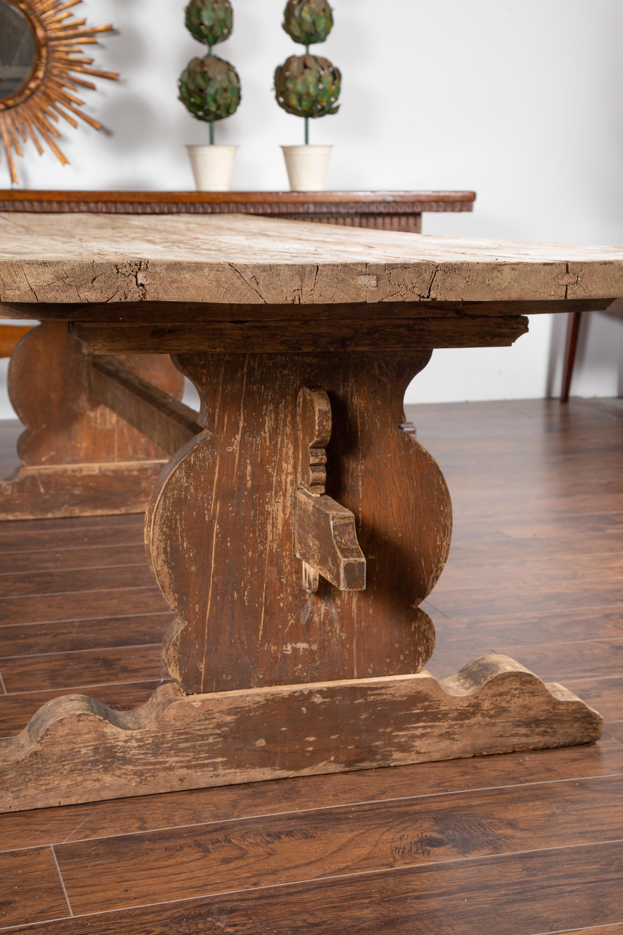 English 1880s Oak Farm Dining Table with Carved Trestle Base and Aged Patina 3