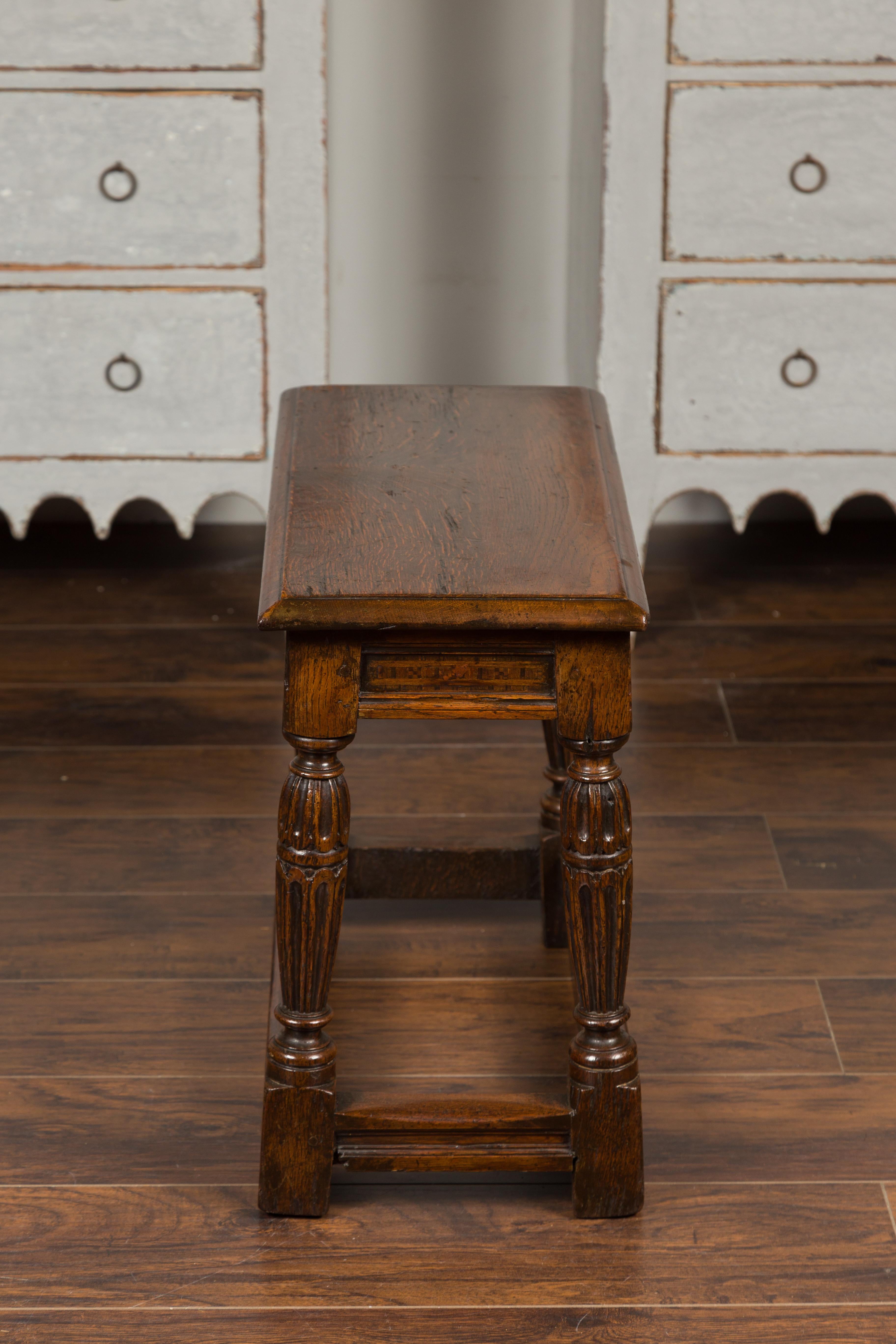 English 1880s Oak Joint Stool with Inlaid Apron, Carved Legs and Side Stretchers 6
