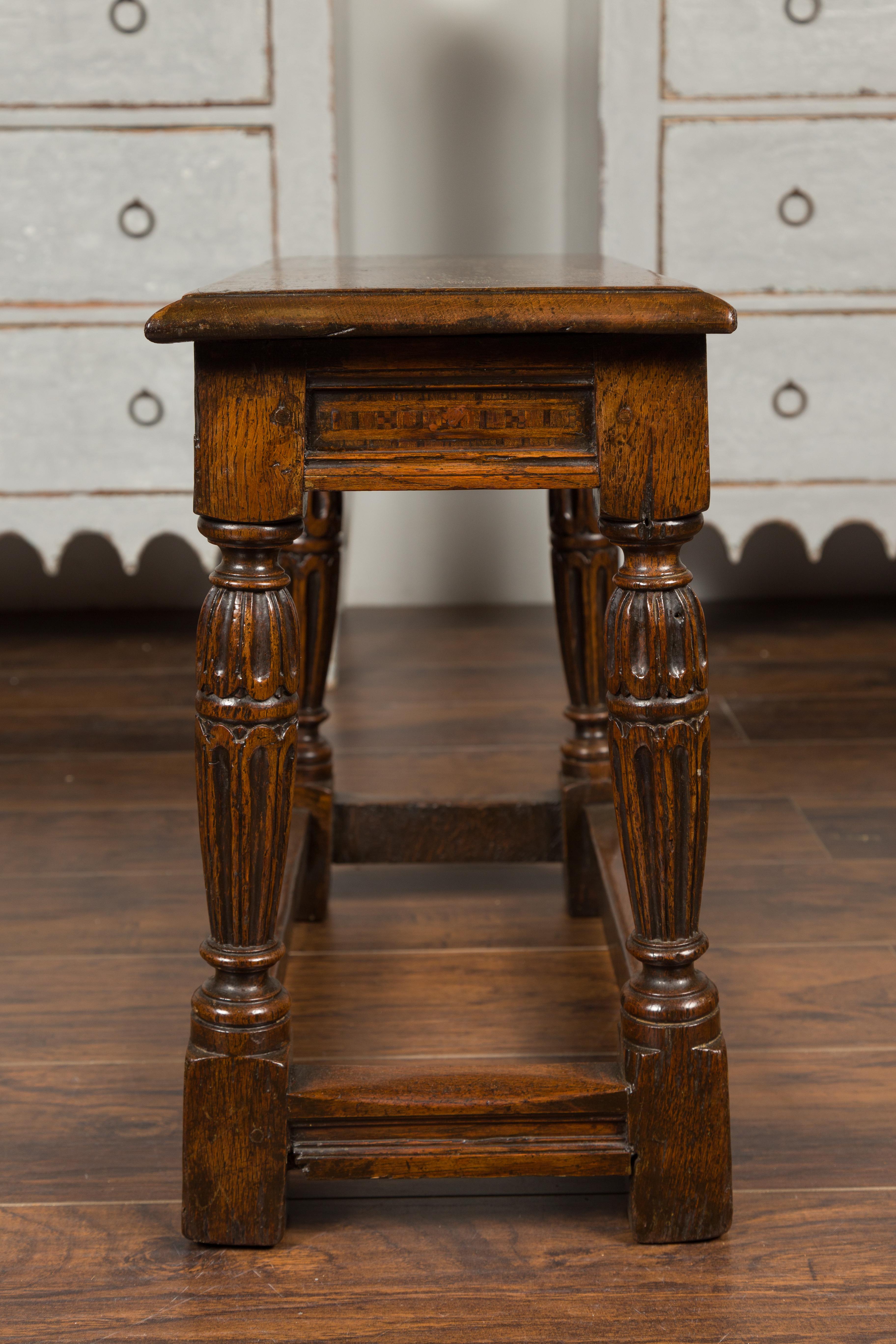 English 1880s Oak Joint Stool with Inlaid Apron, Carved Legs and Side Stretchers 8