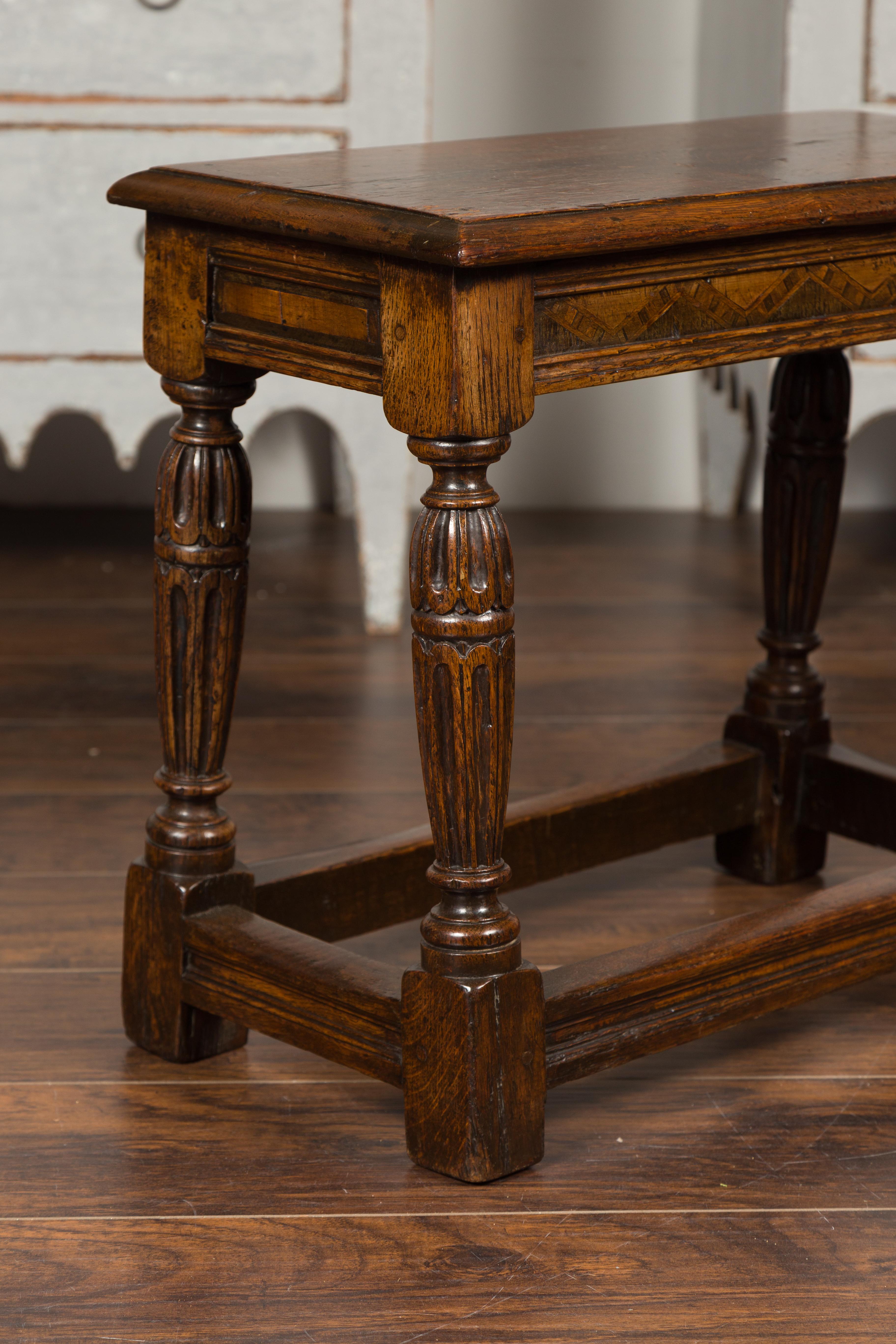 English 1880s Oak Joint Stool with Inlaid Apron, Carved Legs and Side Stretchers 3