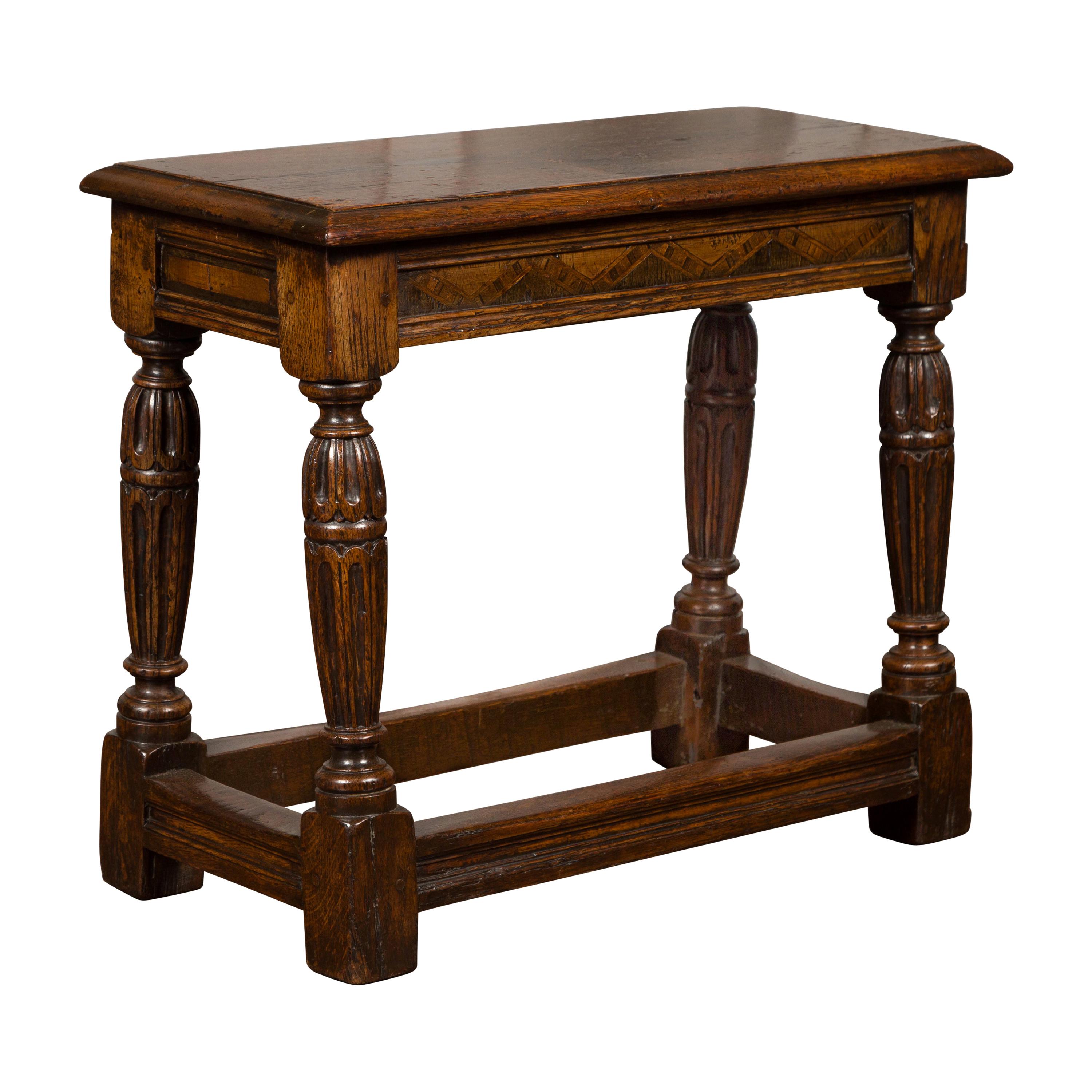 English 1880s Oak Joint Stool with Inlaid Apron, Carved Legs and Side Stretchers