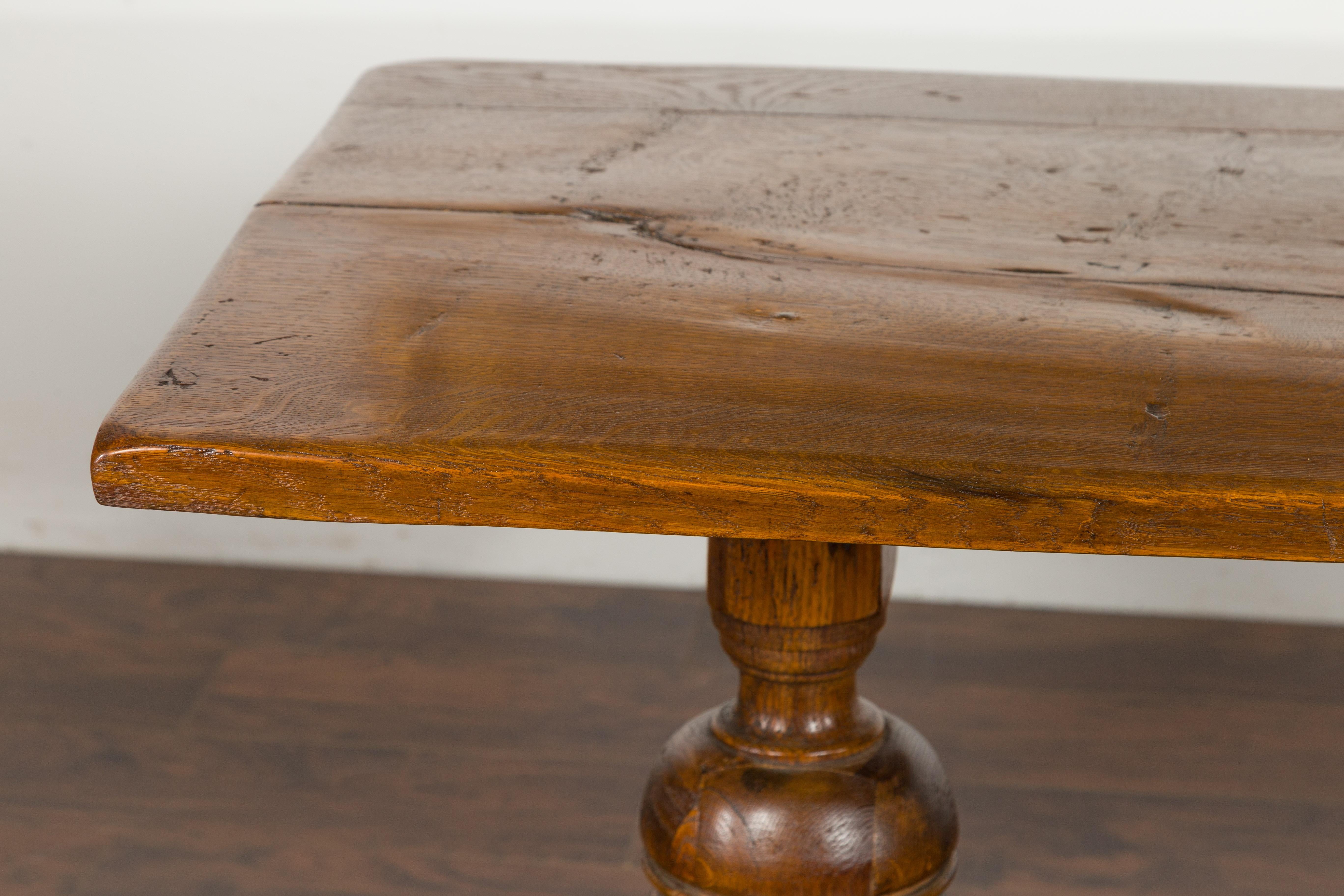 19th Century English 1880s Oak Table with Large Turned Legs and Low Cross Stretcher For Sale