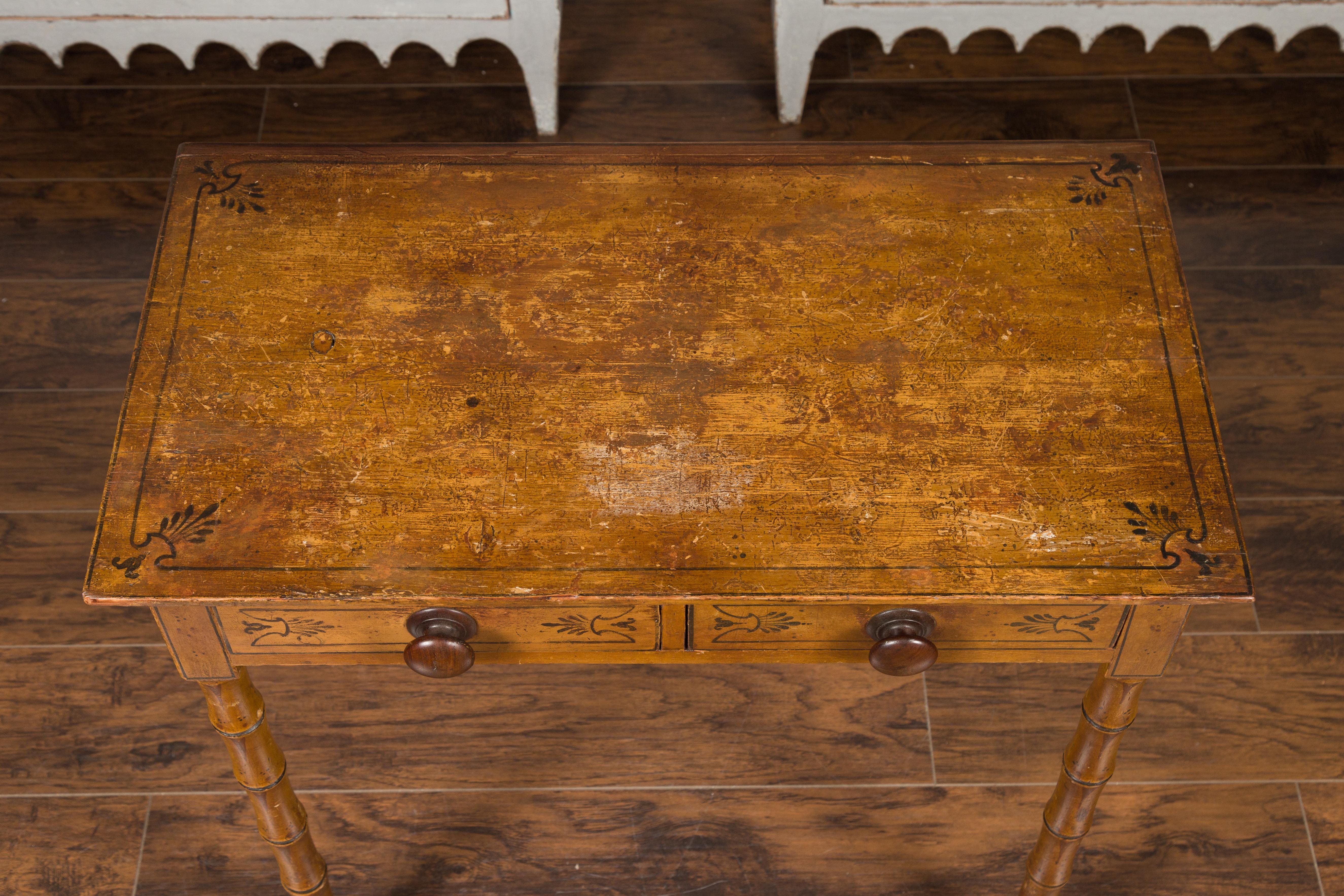 English 1880s Table with Painted Motifs, Two Drawers and Faux Bamboo Legs 6