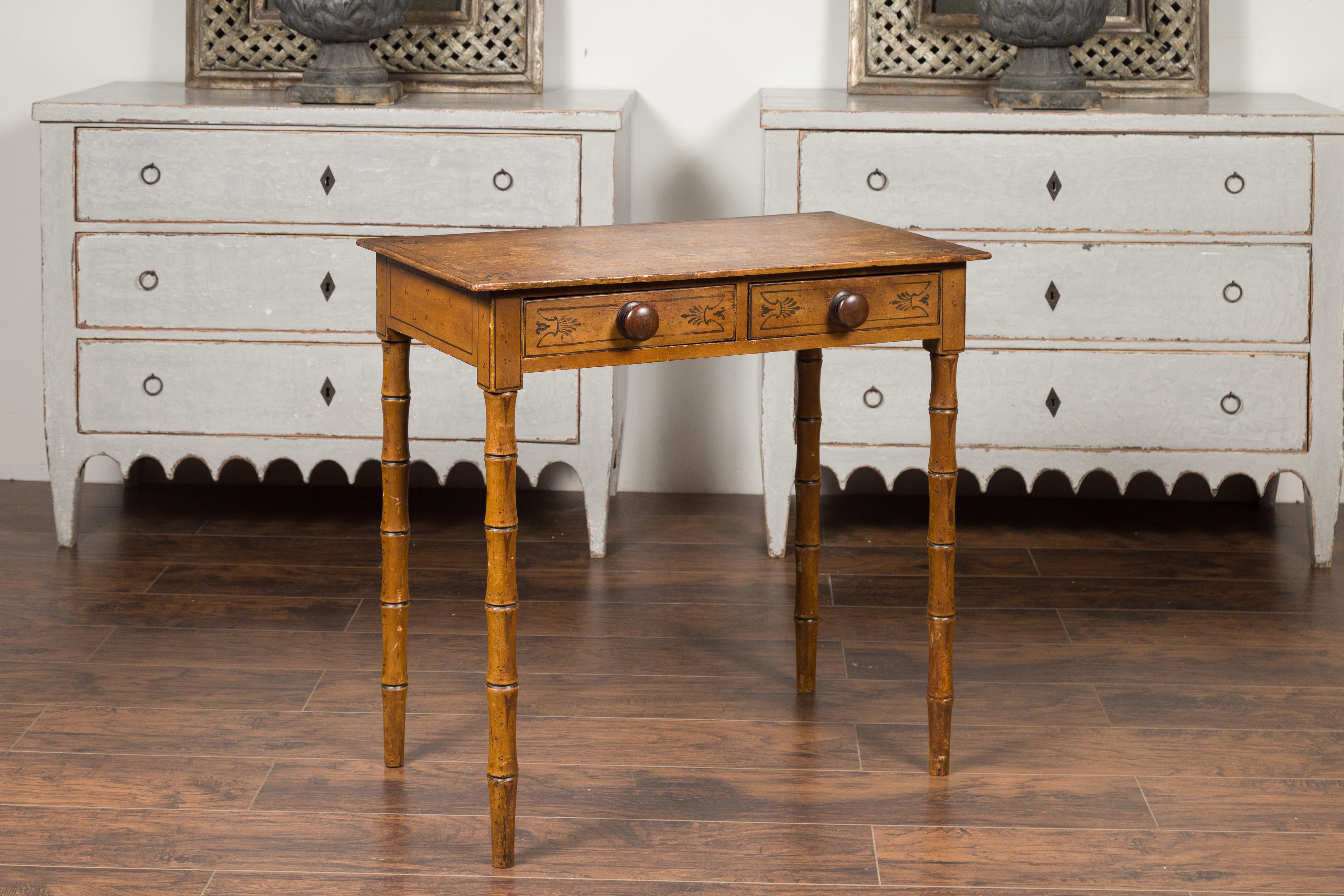 19th Century English 1880s Table with Painted Motifs, Two Drawers and Faux Bamboo Legs For Sale
