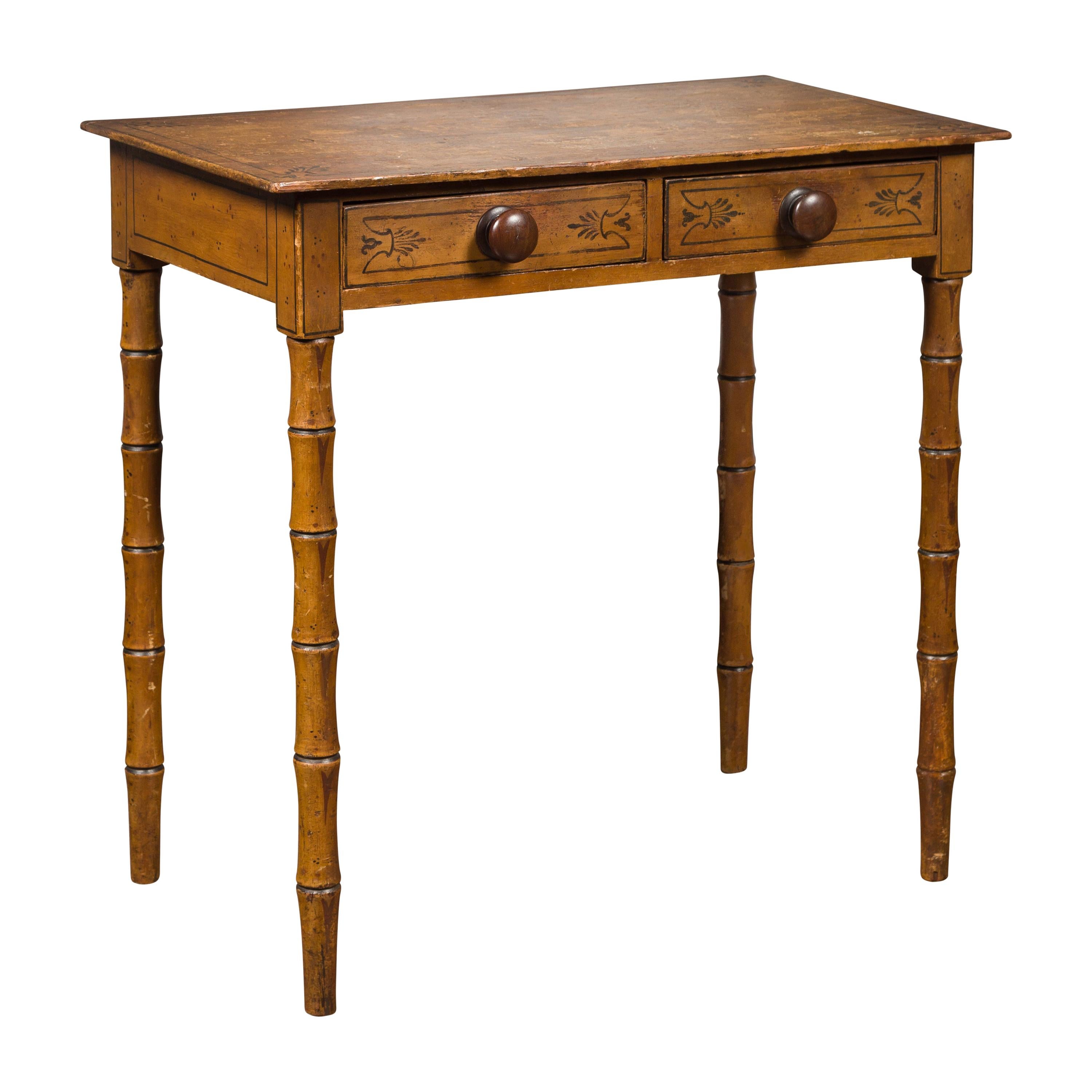 English 1880s Table with Painted Motifs, Two Drawers and Faux Bamboo Legs For Sale