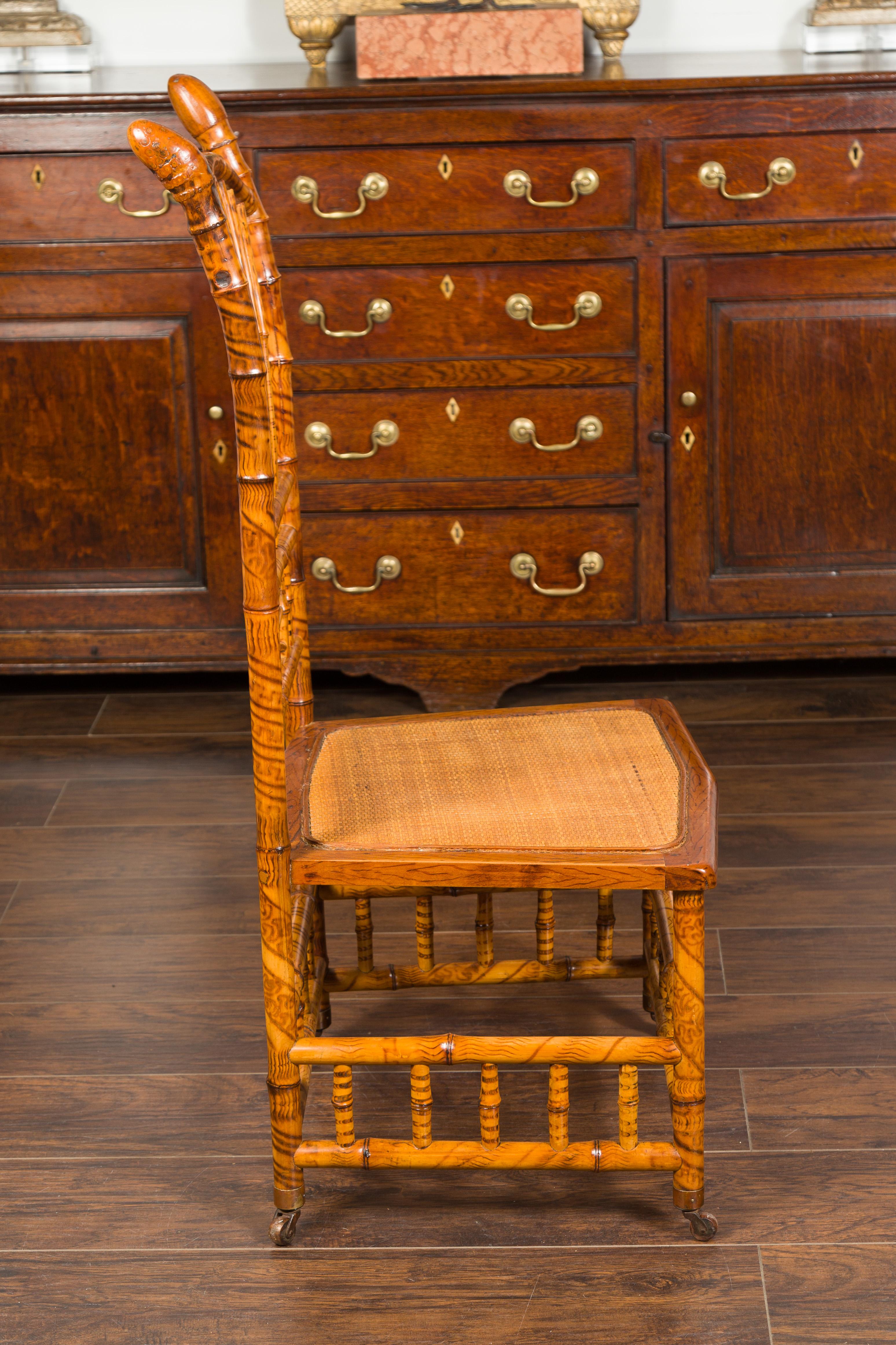 English 1890s Bamboo Slipper Chair with Fan Back, Rattan Seat and Casters For Sale 4