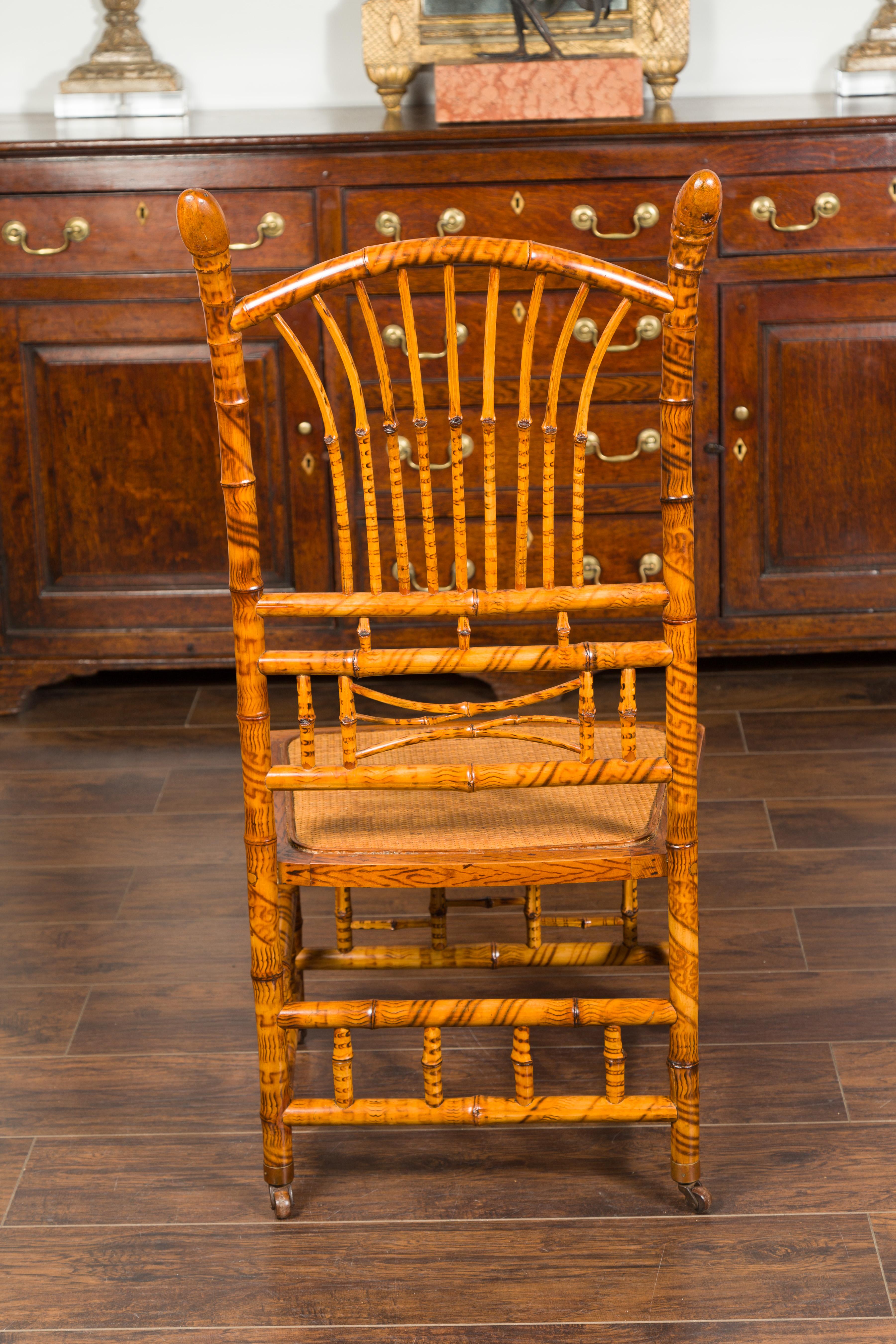 English 1890s Bamboo Slipper Chair with Fan Back, Rattan Seat and Casters For Sale 5