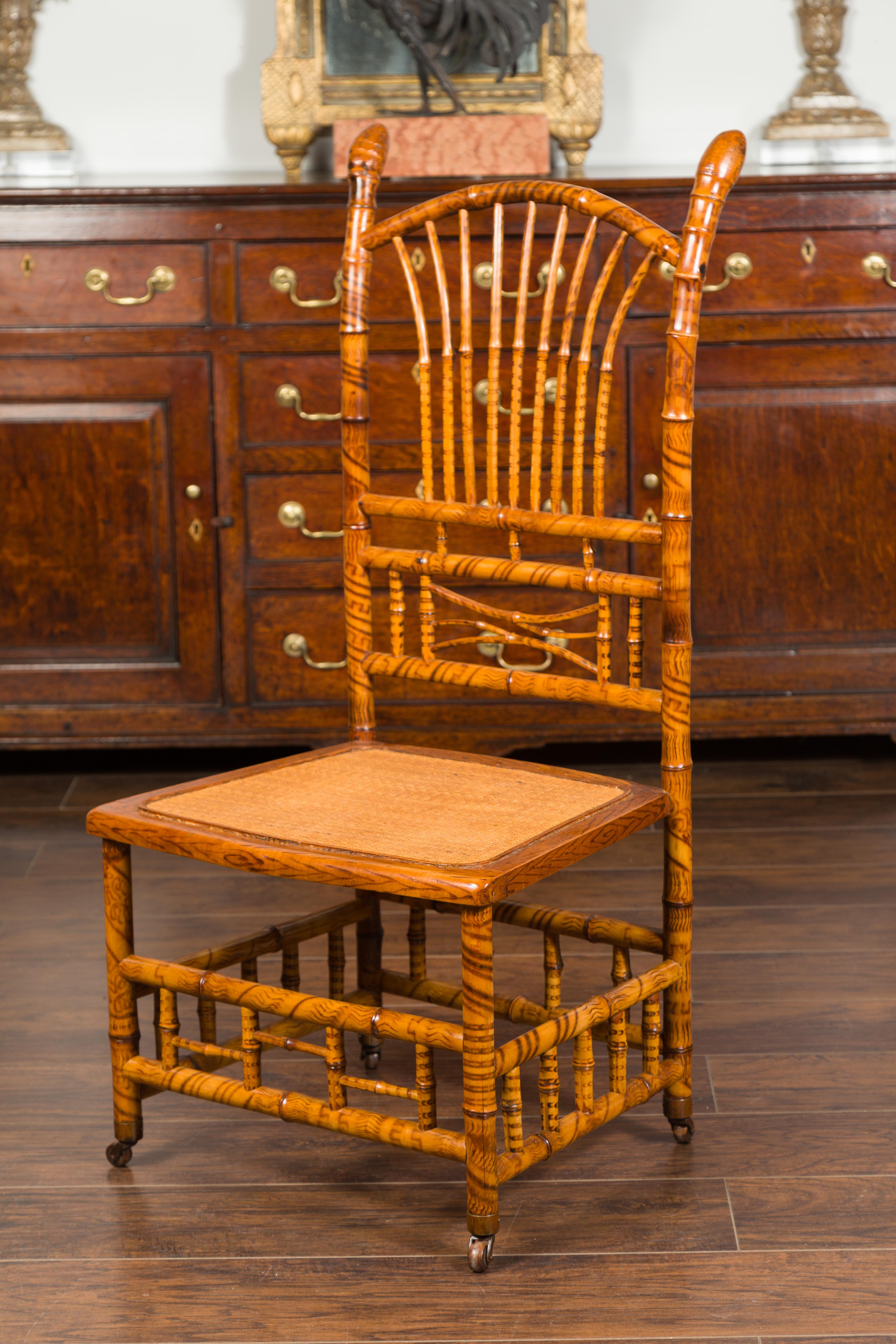 English 1890s Bamboo Slipper Chair with Fan Back, Rattan Seat and Casters For Sale 8